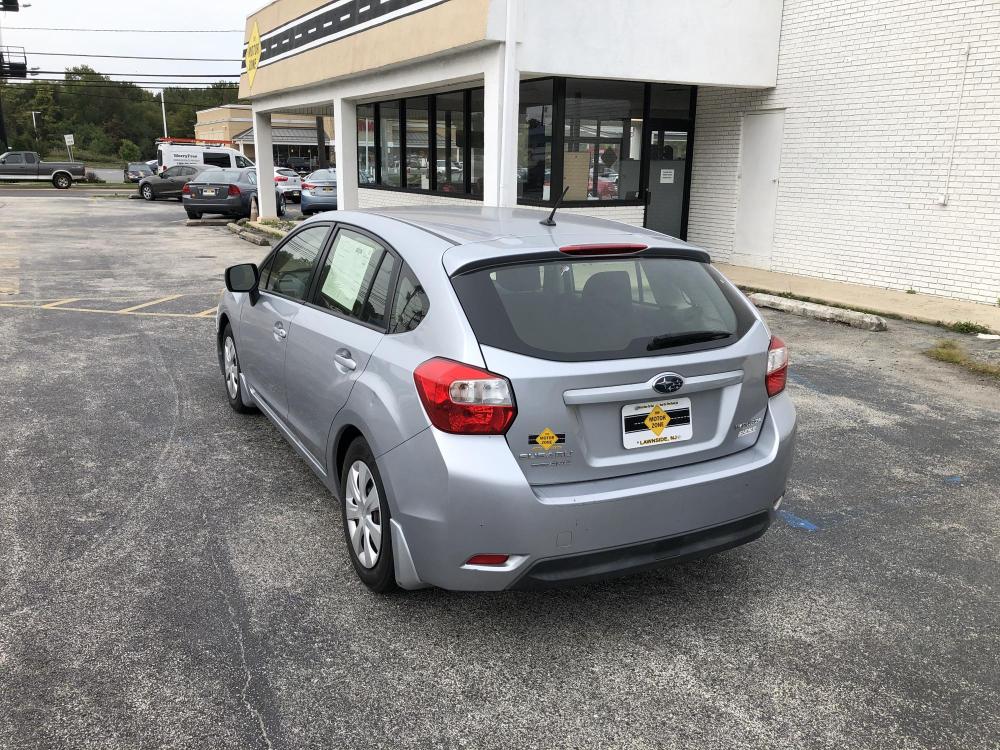 2013 Silver Subaru Impreza (JF1GPAA68DH) with an 4-Cyl, PZEV, 2.0 Liter engine, Automatic, CVT w/Manual Mode transmission, located at 341 N White Horse Pike, Lawnside, NJ, 08045, (888) -696, 39.855621, -75.027451 - Photo #0