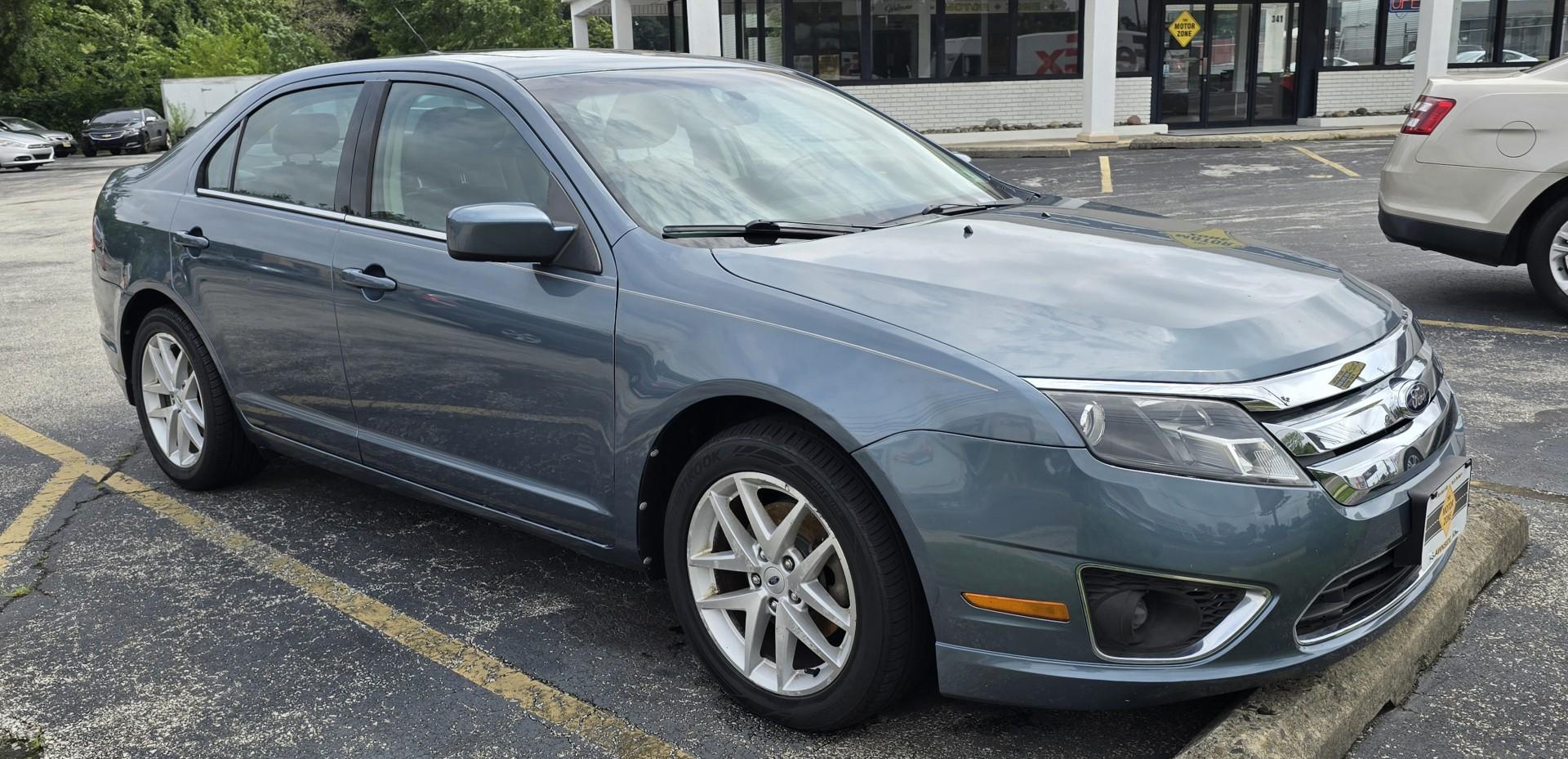 2012 Blue Ford Fusion SEL (3FAHP0JG5CR) with an V6, Flex Fuel, 3.0 Liter engine, Automatic, 6-Spd w/SelectShift transmission, located at 1010 N White Horse Pike, Stratford, NJ, 08084, (856) 262-9500, 39.838921, -75.011497 - Photo#1