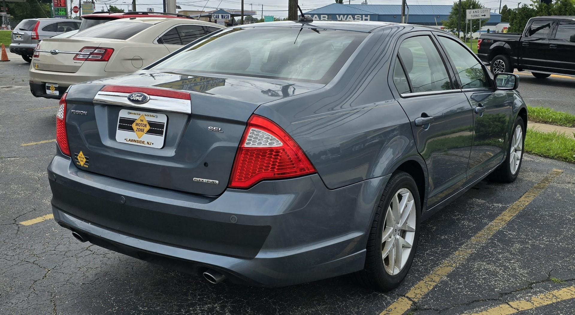 2012 Blue Ford Fusion SEL (3FAHP0JG5CR) with an V6, Flex Fuel, 3.0 Liter engine, Automatic, 6-Spd w/SelectShift transmission, located at 1010 N White Horse Pike, Stratford, NJ, 08084, (856) 262-9500, 39.838921, -75.011497 - Photo#2