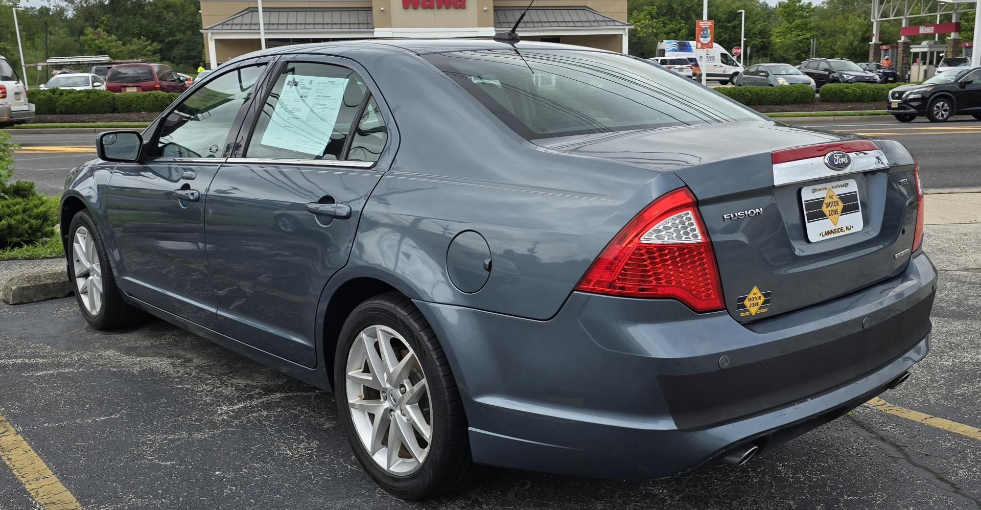 2012 Blue Ford Fusion SEL (3FAHP0JG5CR) with an V6, Flex Fuel, 3.0 Liter engine, Automatic, 6-Spd w/SelectShift transmission, located at 1010 N White Horse Pike, Stratford, NJ, 08084, (856) 262-9500, 39.838921, -75.011497 - Photo#3