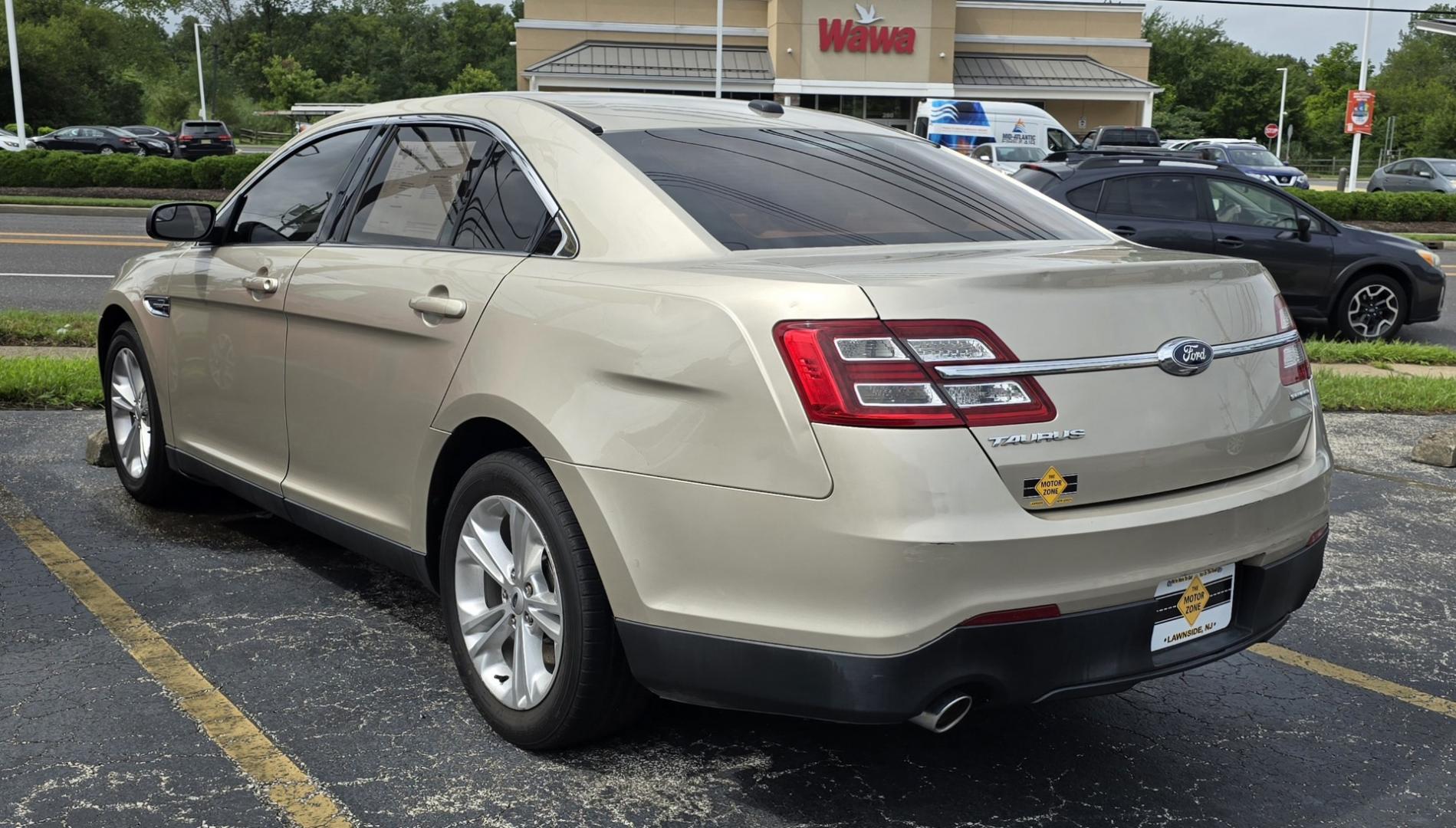 2017 Tan Ford Taurus SE (1FAHP2D85HG) with an V6, 3.5 Liter engine, Auto, 6-Spd w/SelShft transmission, located at 1010 N White Horse Pike, Stratford, NJ, 08084, (856) 262-9500, 39.838921, -75.011497 - Photo#2
