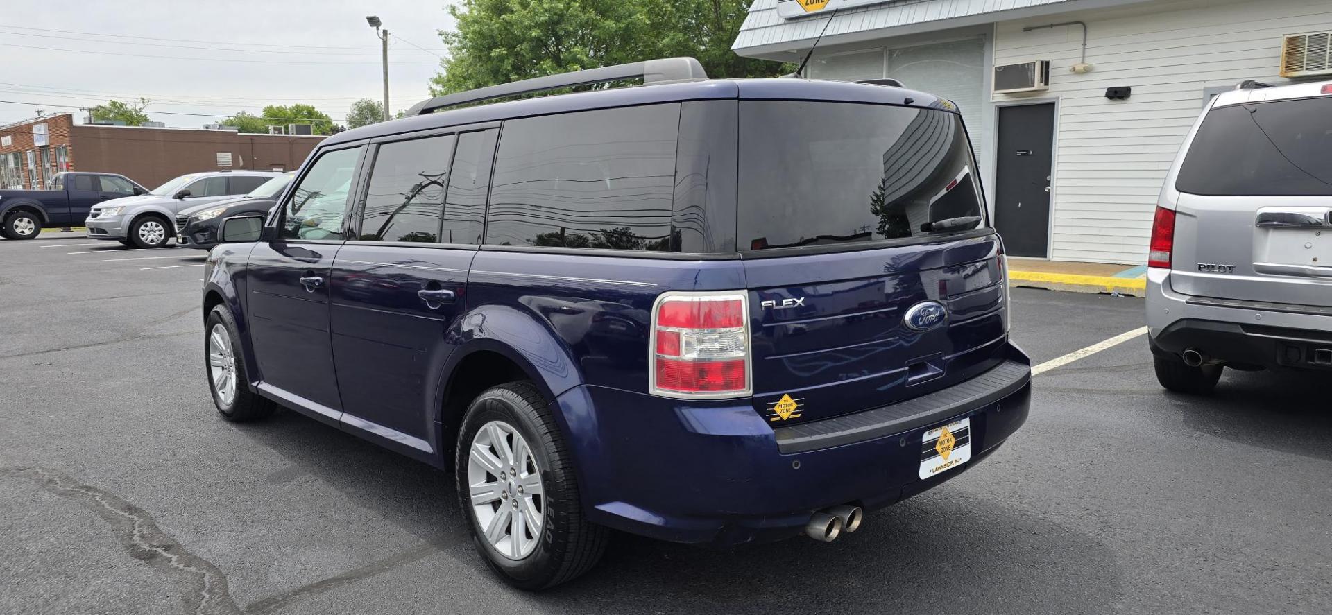 2011 Blue Ford Flex SE (2FMGK5BC0BB) with an V6, 3.5 Liter engine, Automatic, 6-Spd transmission, located at 1010 N White Horse Pike, Stratford, NJ, 08084, (856) 262-9500, 39.838921, -75.011497 - Photo#2