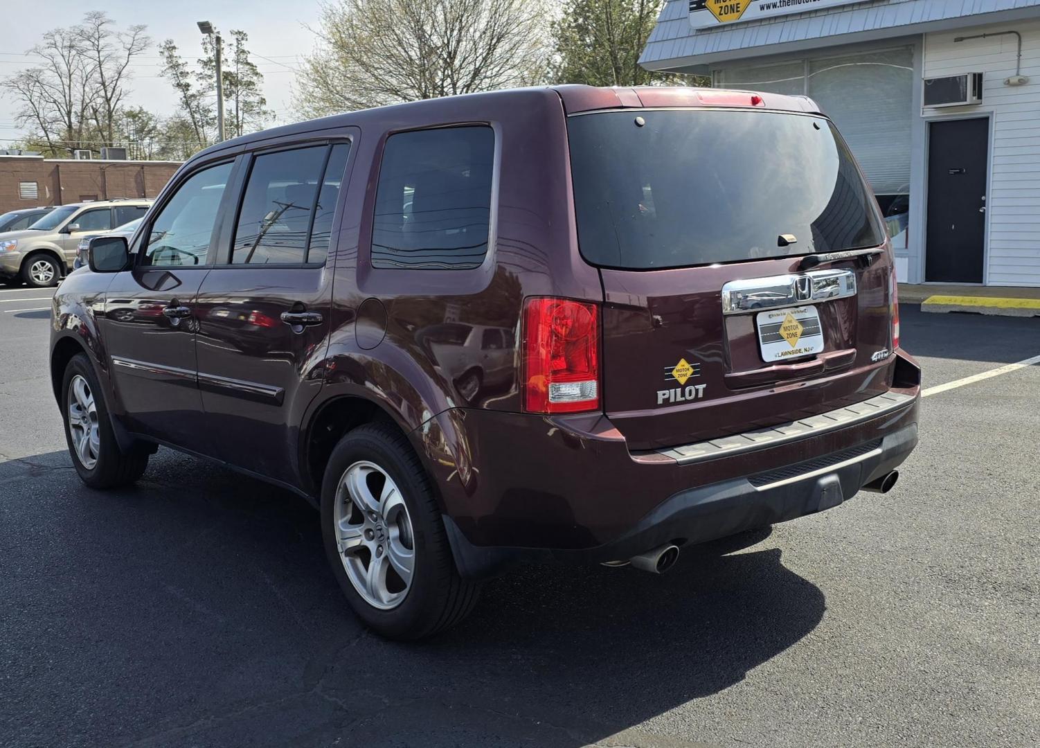 2013 Red Honda Pilot (5FNYF4H50DB) with an V6, i-VTEC, 3.5 Liter engine, Automatic, 5-Spd transmission, located at 1010 N White Horse Pike, Stratford, NJ, 08084, (856) 262-9500, 39.838921, -75.011497 - Photo#3