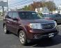 2013 Red Honda Pilot (5FNYF4H50DB) with an V6, i-VTEC, 3.5 Liter engine, Automatic, 5-Spd transmission, located at 341 N White Horse Pike, Lawnside, NJ, 08045, (856) 262-9500, 39.855621, -75.027451 - Photo#1