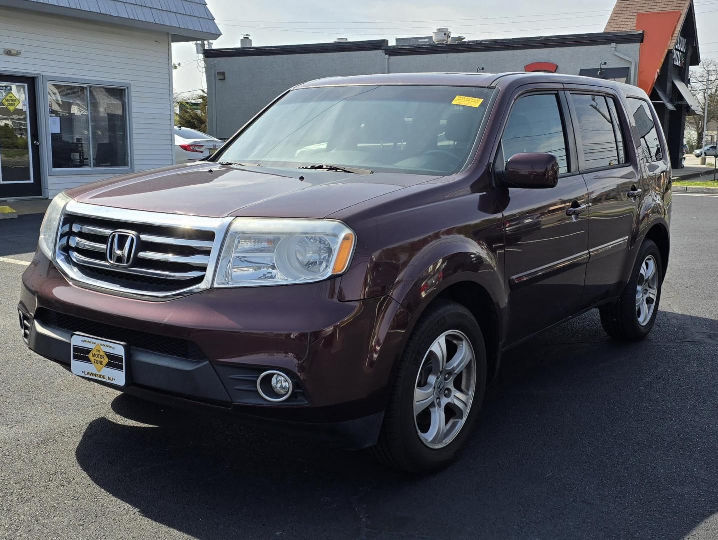 2013 Red Honda Pilot (5FNYF4H50DB) with an V6, i-VTEC, 3.5 Liter engine, Automatic, 5-Spd transmission, located at 1010 N White Horse Pike, Stratford, NJ, 08084, (856) 262-9500, 39.838921, -75.011497 - Photo#0