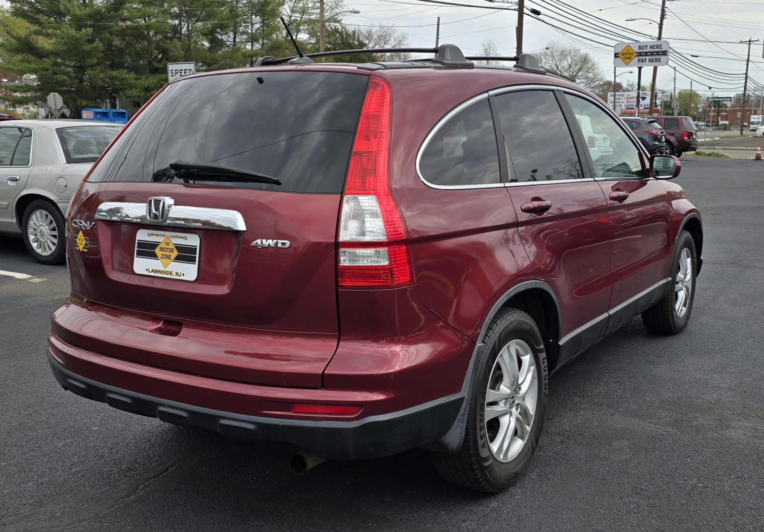 2011 Red Honda CR-V EX-L (5J6RE4H73BL) with an 4-Cyl, VTEC, 2.4 Liter engine, Automatic, 5-Spd w/Overdrive transmission, located at 1010 N White Horse Pike, Stratford, NJ, 08084, (856) 262-9500, 39.838921, -75.011497 - Photo#3