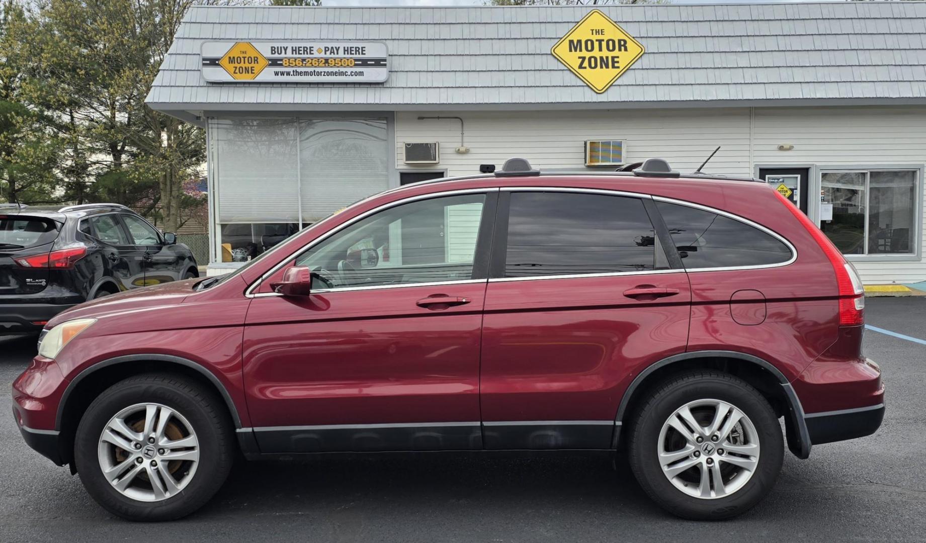 2011 Red Honda CR-V EX-L (5J6RE4H73BL) with an 4-Cyl, VTEC, 2.4 Liter engine, Automatic, 5-Spd w/Overdrive transmission, located at 1010 N White Horse Pike, Stratford, NJ, 08084, (856) 262-9500, 39.838921, -75.011497 - Photo#2