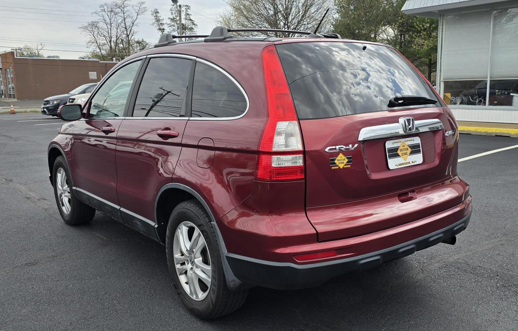 2011 Red Honda CR-V EX-L (5J6RE4H73BL) with an 4-Cyl, VTEC, 2.4 Liter engine, Automatic, 5-Spd w/Overdrive transmission, located at 1010 N White Horse Pike, Stratford, NJ, 08084, (856) 262-9500, 39.838921, -75.011497 - Photo#4