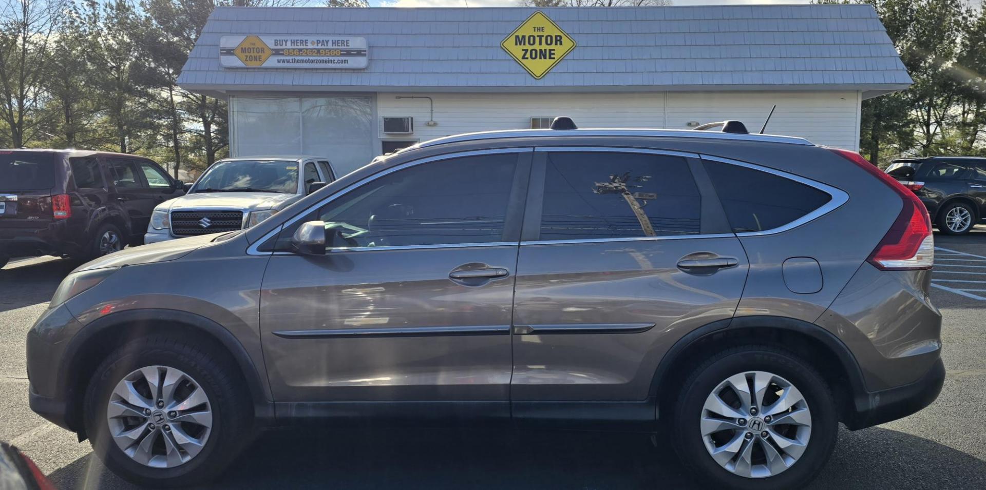 2013 Brown Honda CR-V EX-L (5J6RM4H79DL) with an 4-Cyl, i-VTEC, 2.4 Liter engine, Automatic, 5-Spd transmission, located at 1010 N White Horse Pike, Stratford, NJ, 08084, (856) 262-9500, 39.838921, -75.011497 - Photo#3