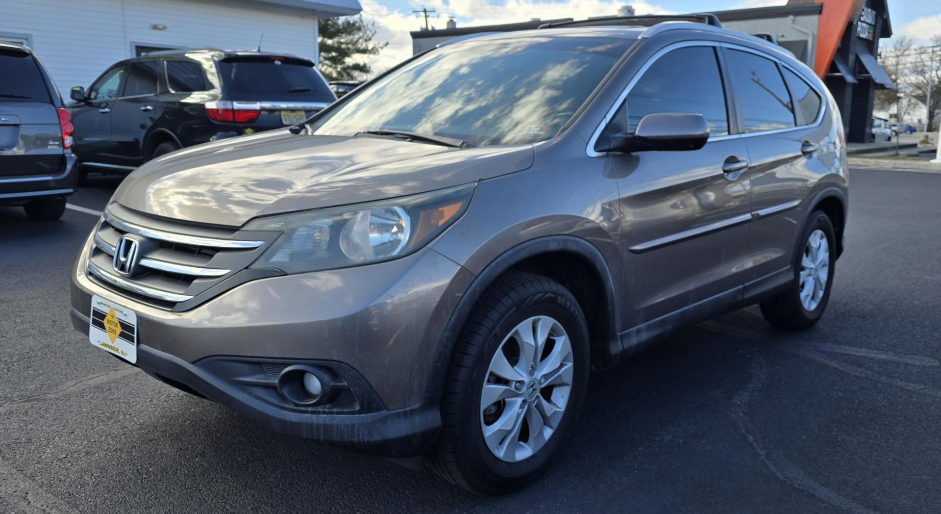 2013 Brown Honda CR-V EX-L (5J6RM4H79DL) with an 4-Cyl, i-VTEC, 2.4 Liter engine, Automatic, 5-Spd transmission, located at 1010 N White Horse Pike, Stratford, NJ, 08084, (856) 262-9500, 39.838921, -75.011497 - Photo#1