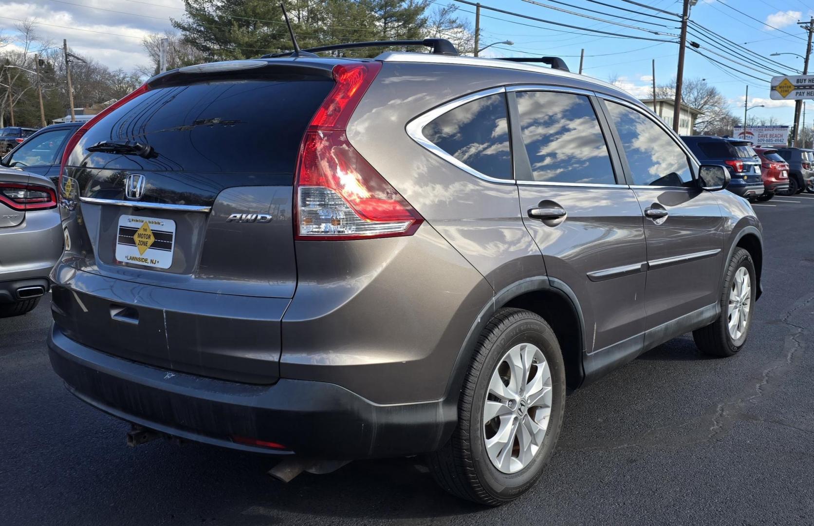 2013 Brown Honda CR-V EX-L (5J6RM4H79DL) with an 4-Cyl, i-VTEC, 2.4 Liter engine, Automatic, 5-Spd transmission, located at 1010 N White Horse Pike, Stratford, NJ, 08084, (856) 262-9500, 39.838921, -75.011497 - Photo#2