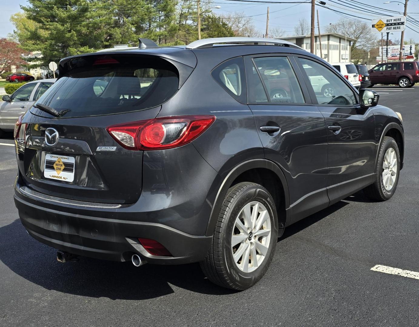 2014 Gray MAZDA CX-5 (JM3KE2BE6E0) with an 4-Cyl, SKYACTIV-G, 2.0L engine, Auto, 6-Spd w/MM transmission, located at 1010 N White Horse Pike, Stratford, NJ, 08084, (856) 262-9500, 39.838921, -75.011497 - Photo#4