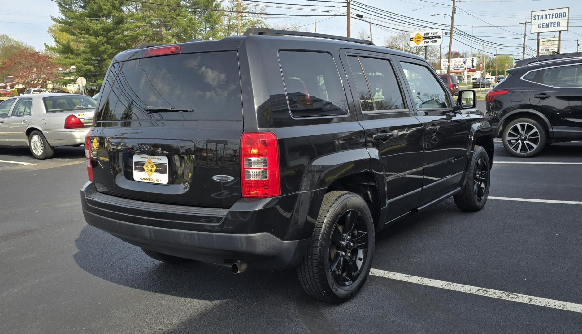 2015 Black Jeep Patriot (1C4NJPBA2FD) with an 4-Cyl, 2.0 Liter engine, Automatic, CVT transmission, located at 1010 N White Horse Pike, Stratford, NJ, 08084, (856) 262-9500, 39.838921, -75.011497 - Photo#3