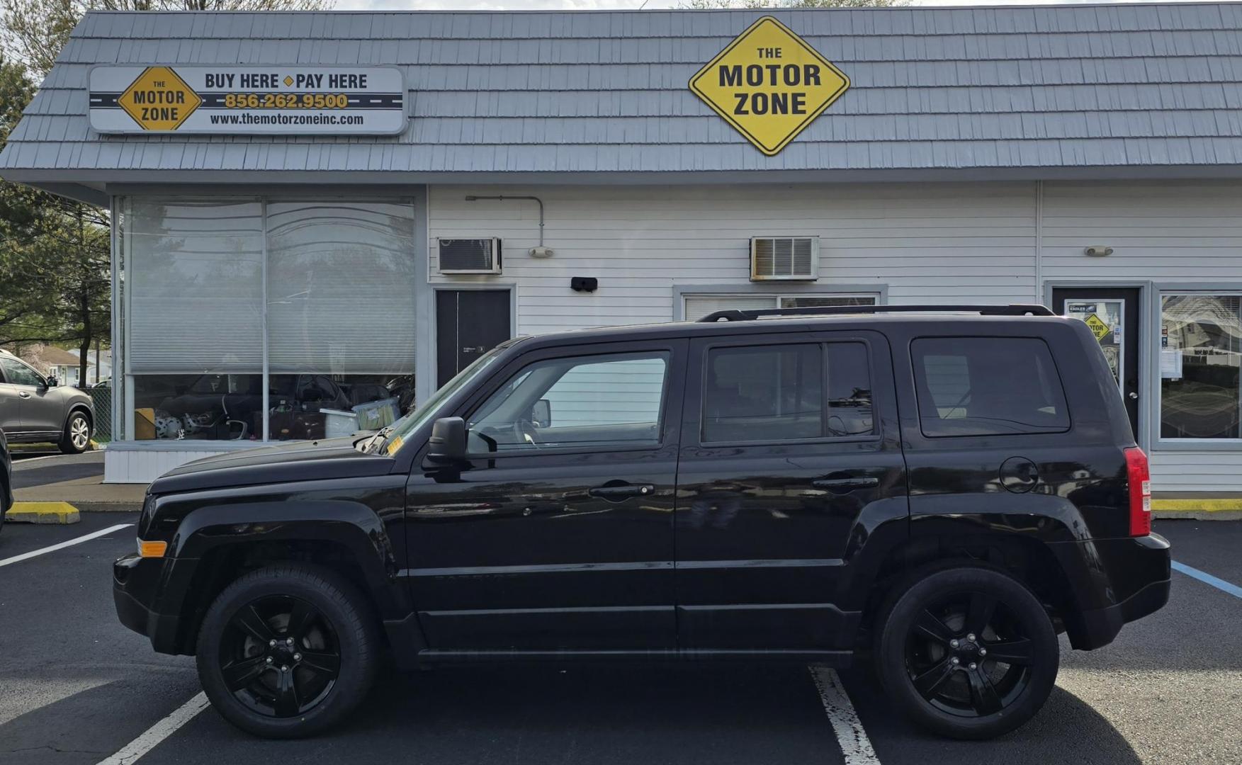 2015 Black Jeep Patriot (1C4NJPBA2FD) with an 4-Cyl, 2.0 Liter engine, Automatic, CVT transmission, located at 1010 N White Horse Pike, Stratford, NJ, 08084, (856) 262-9500, 39.838921, -75.011497 - Photo#2