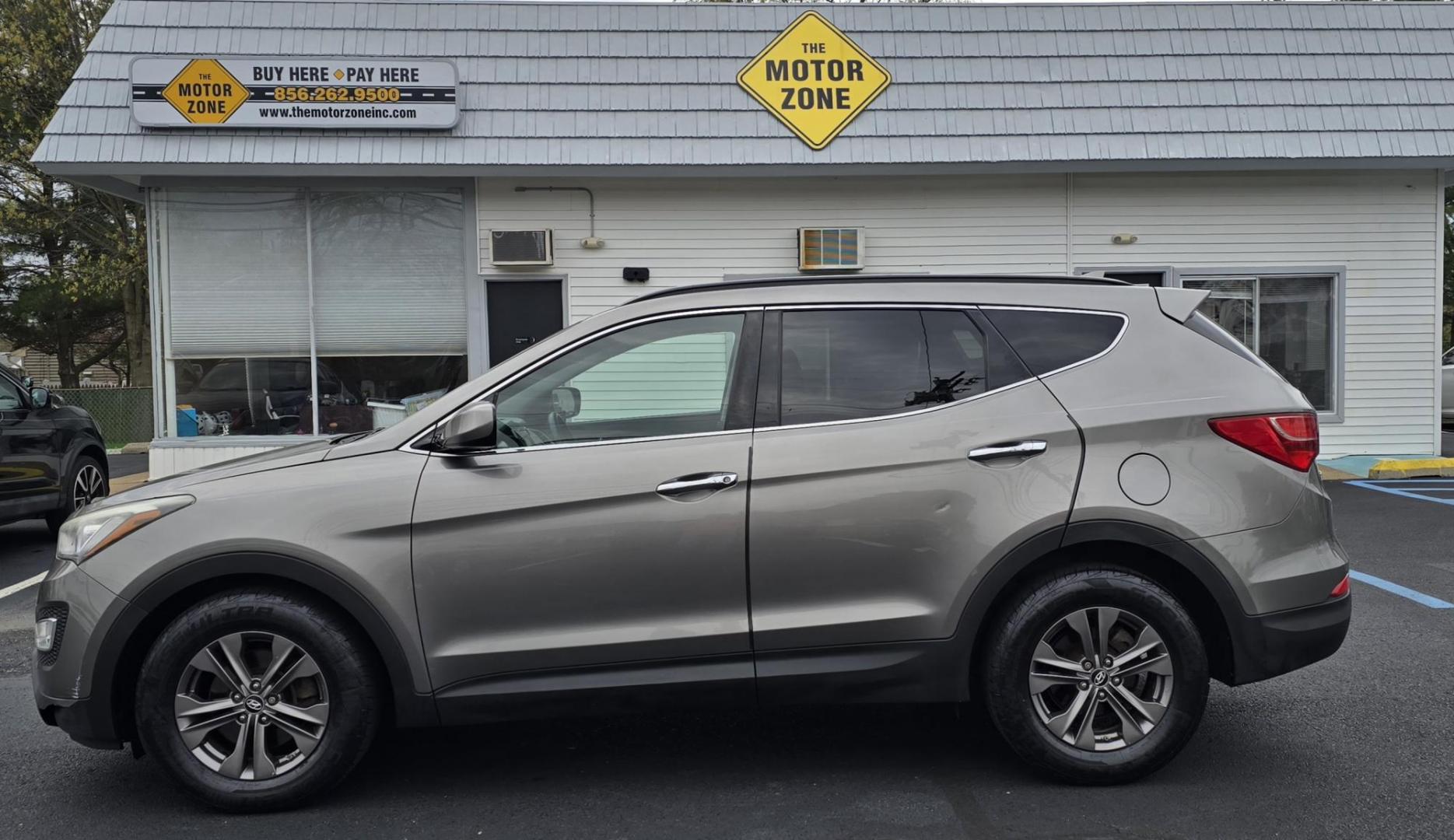 2013 Gray /Gray Hyundai Santa Fe Sport Sport (5XYZUDLBXDG) with an 4-Cyl, GDI, 2.4 Liter engine, Auto, 6-Spd w/Shftrnc transmission, located at 1010 N White Horse Pike, Stratford, NJ, 08084, (856) 262-9500, 39.838921, -75.011497 - Photo#2