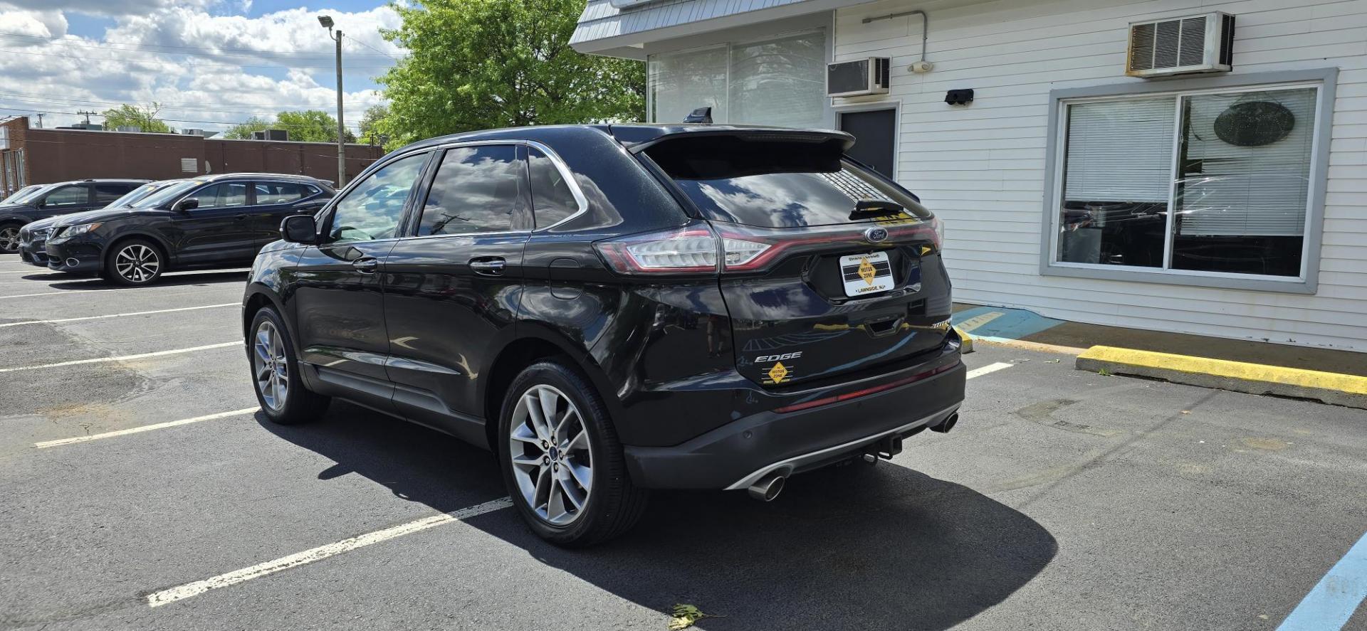 2015 Black /Saddle Ford Edge Titanium AWD (2FMTK4K82FB) with an 3.5L V6 DOHC 24V engine, 6-Speed Automatic transmission, located at 1010 N White Horse Pike, Stratford, NJ, 08084, (856) 262-9500, 39.838921, -75.011497 - Photo#3