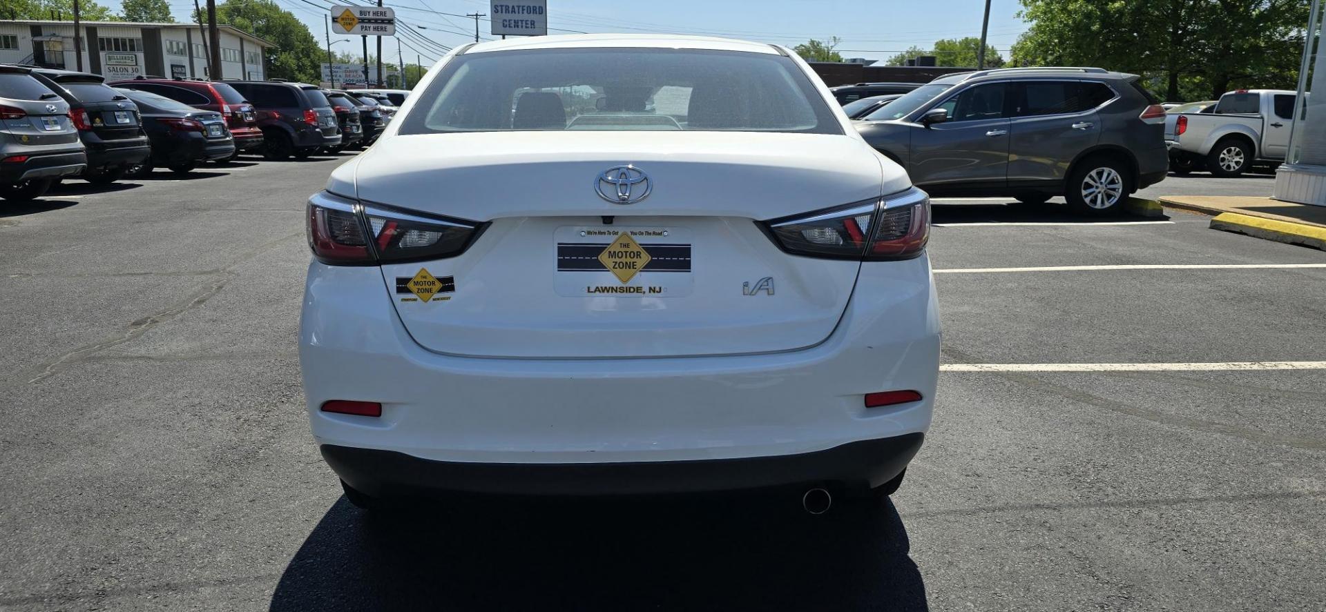 2018 White /Black Toyota Yaris iA 6A (3MYDLBYV7JY) with an 1.5L L4 DOHC 16V engine, 6A transmission, located at 1010 N White Horse Pike, Stratford, NJ, 08084, (856) 262-9500, 39.838921, -75.011497 - Photo#6
