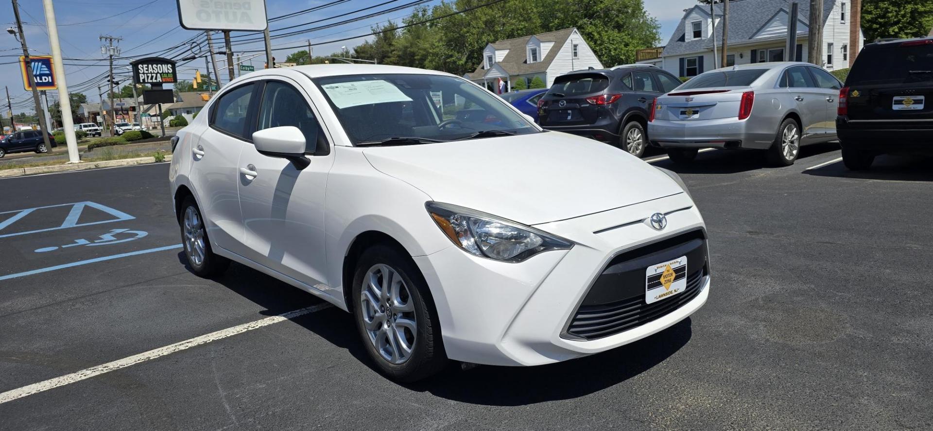 2018 White /Black Toyota Yaris iA 6A (3MYDLBYV7JY) with an 1.5L L4 DOHC 16V engine, 6A transmission, located at 1010 N White Horse Pike, Stratford, NJ, 08084, (856) 262-9500, 39.838921, -75.011497 - Photo#1