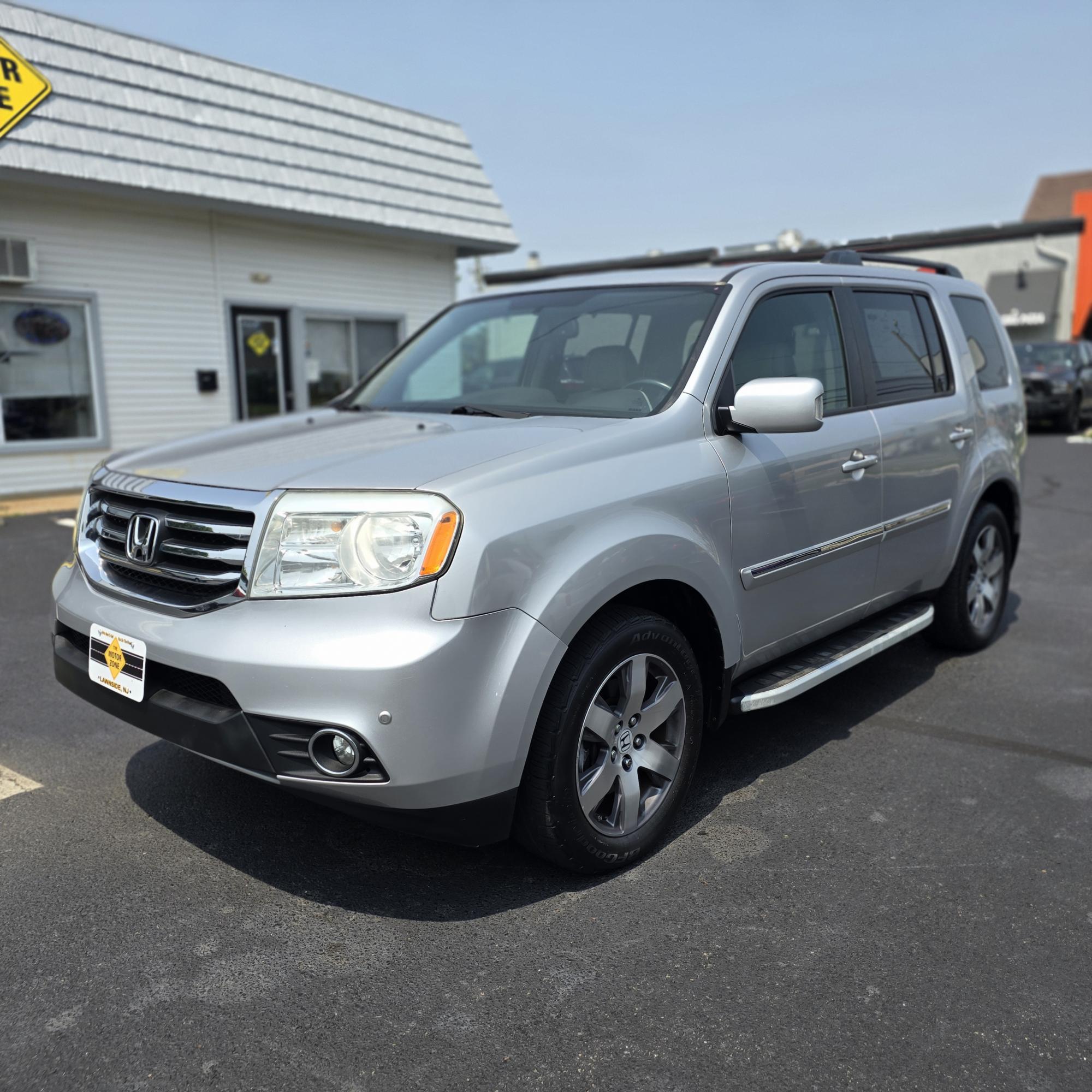 photo of 2013 Honda Pilot Touring 4WD 5-Spd AT with DVD