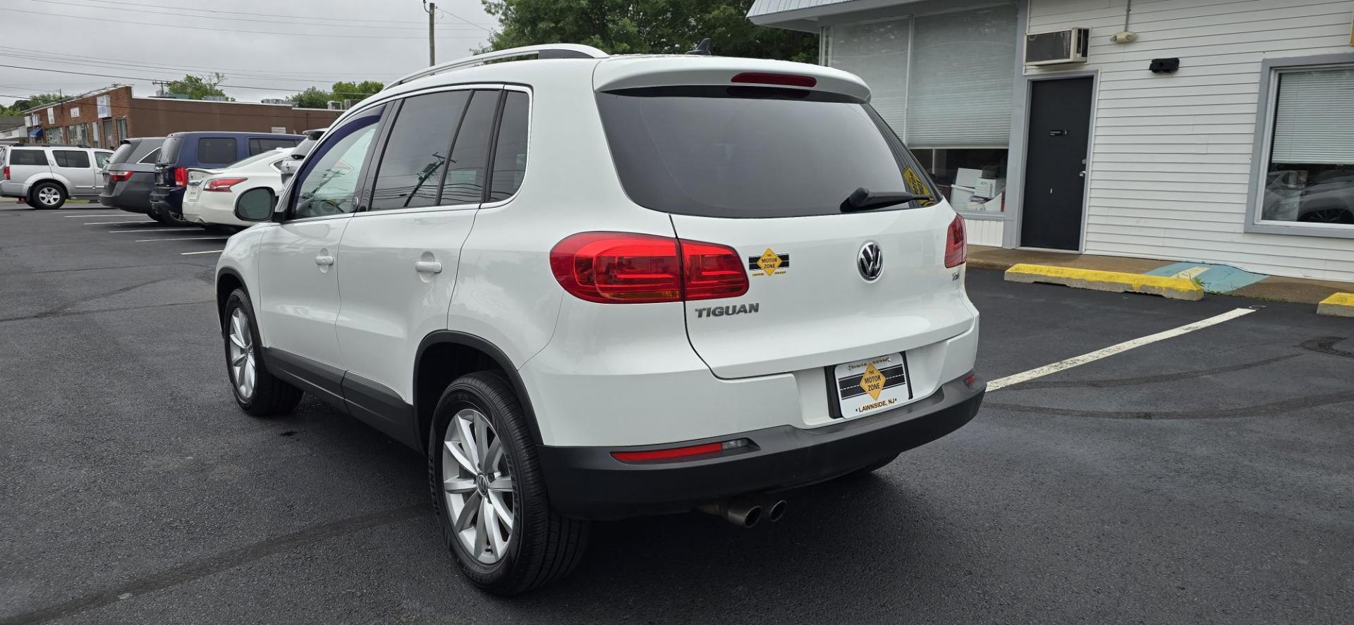 2017 White /Black Volkswagen Tiguan Wolfsburg Edition (WVGRV7AX1HW) with an 2.0L L4 DOHC 16V TURBO engine, 6A transmission, located at 1010 N White Horse Pike, Stratford, NJ, 08084, (856) 262-9500, 39.838921, -75.011497 - Photo#4