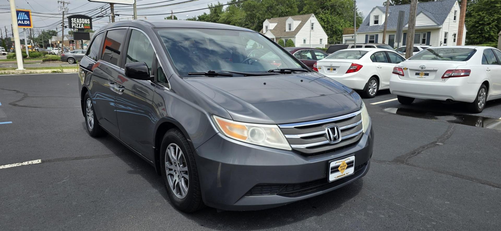 2013 Gray /Silver Honda Odyssey EX (5FNRL5H44DB) with an 3.5L V6 SOHC 24V engine, 5-Speed Automatic transmission, located at 1010 N White Horse Pike, Stratford, NJ, 08084, (856) 262-9500, 39.838921, -75.011497 - If an SUV is just too big and too fuel-thirsty, the 2013 Honda Odyssey is your next best bet. It’s EPA-rated at 28 mpg on the highway, has a stylish and modern exterior and lots of room for kids and cargo; it’s one of the best bargains on the market. No one lusts after minivans. They are ofte - Photo#1