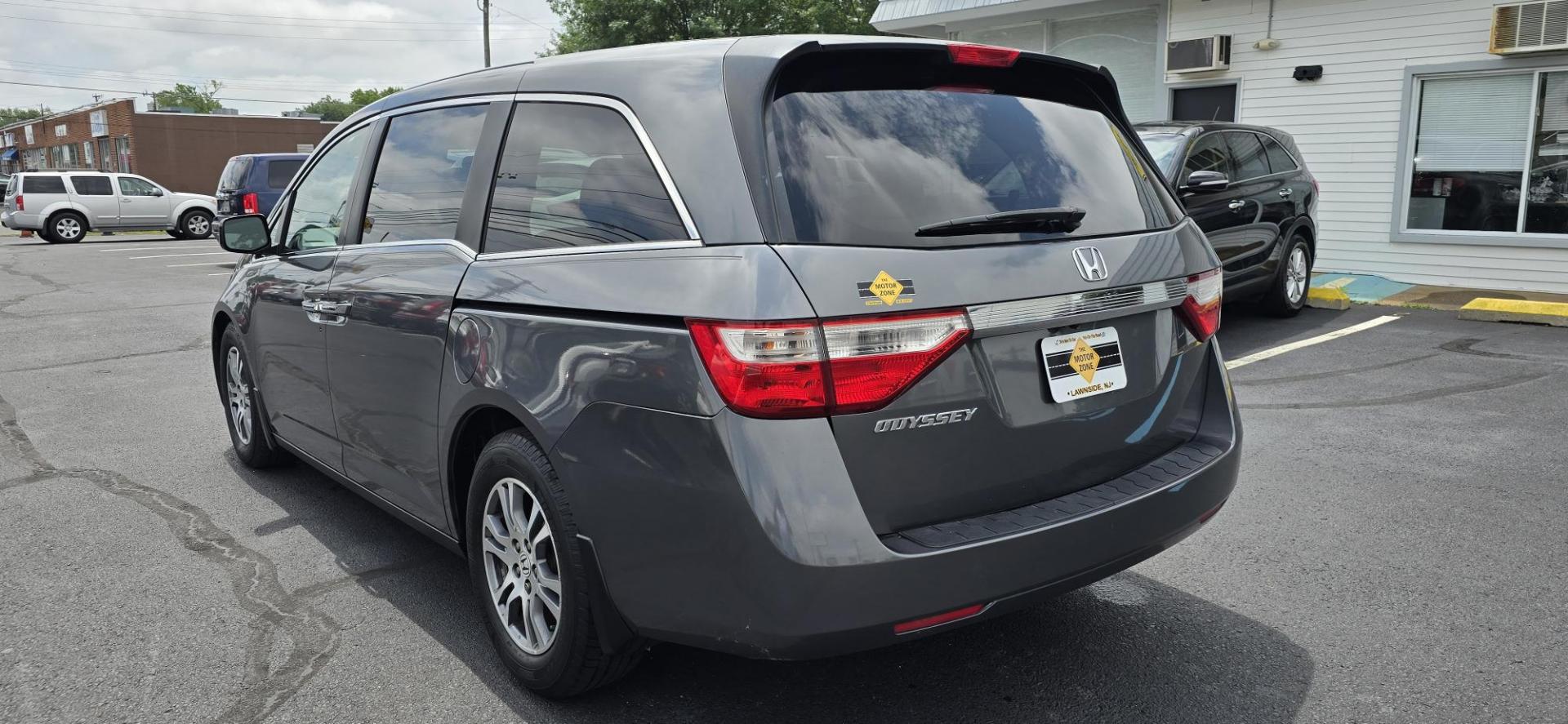 2013 Gray /Silver Honda Odyssey EX (5FNRL5H44DB) with an 3.5L V6 SOHC 24V engine, 5-Speed Automatic transmission, located at 1010 N White Horse Pike, Stratford, NJ, 08084, (856) 262-9500, 39.838921, -75.011497 - If an SUV is just too big and too fuel-thirsty, the 2013 Honda Odyssey is your next best bet. It’s EPA-rated at 28 mpg on the highway, has a stylish and modern exterior and lots of room for kids and cargo; it’s one of the best bargains on the market. No one lusts after minivans. They are ofte - Photo#6