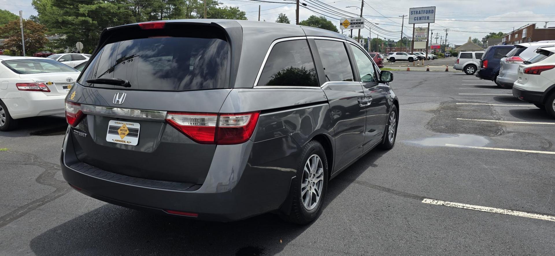 2013 Gray /Silver Honda Odyssey EX (5FNRL5H44DB) with an 3.5L V6 SOHC 24V engine, 5-Speed Automatic transmission, located at 1010 N White Horse Pike, Stratford, NJ, 08084, (856) 262-9500, 39.838921, -75.011497 - If an SUV is just too big and too fuel-thirsty, the 2013 Honda Odyssey is your next best bet. It’s EPA-rated at 28 mpg on the highway, has a stylish and modern exterior and lots of room for kids and cargo; it’s one of the best bargains on the market. No one lusts after minivans. They are ofte - Photo#5