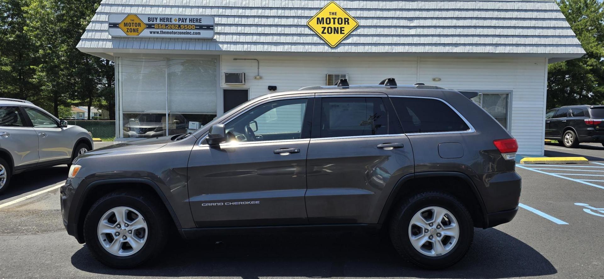 2014 Gray /Black Jeep Grand Cherokee Laredo 4WD (1C4RJFAG2EC) with an 3.6L V6 DOHC 24V engine, 5-Speed Automatic transmission, located at 1010 N White Horse Pike, Stratford, NJ, 08084, (856) 262-9500, 39.838921, -75.011497 - If you want a midsize SUV that does a little of everything, the 2014 Jeep Grand Cherokee is tough to beat. Its well-trimmed cabin is comfy for five, and it's one of the few remaining utility vehicles that can handle both off-road trails and daily commutes. If you haven't been around a new Grand C - Photo#6