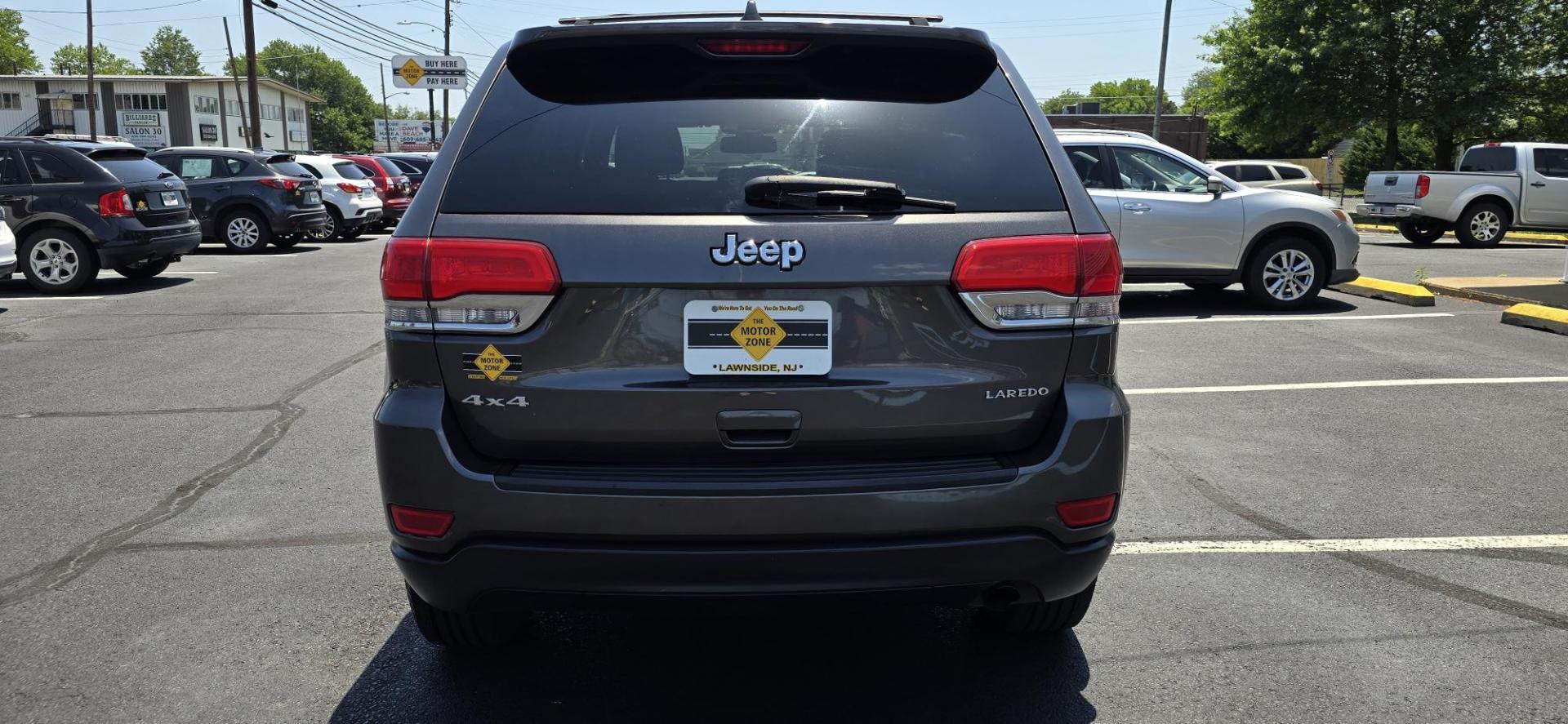 2014 Gray /Black Jeep Grand Cherokee Laredo 4WD (1C4RJFAG2EC) with an 3.6L V6 DOHC 24V engine, 5-Speed Automatic transmission, located at 1010 N White Horse Pike, Stratford, NJ, 08084, (856) 262-9500, 39.838921, -75.011497 - If you want a midsize SUV that does a little of everything, the 2014 Jeep Grand Cherokee is tough to beat. Its well-trimmed cabin is comfy for five, and it's one of the few remaining utility vehicles that can handle both off-road trails and daily commutes. If you haven't been around a new Grand C - Photo#5