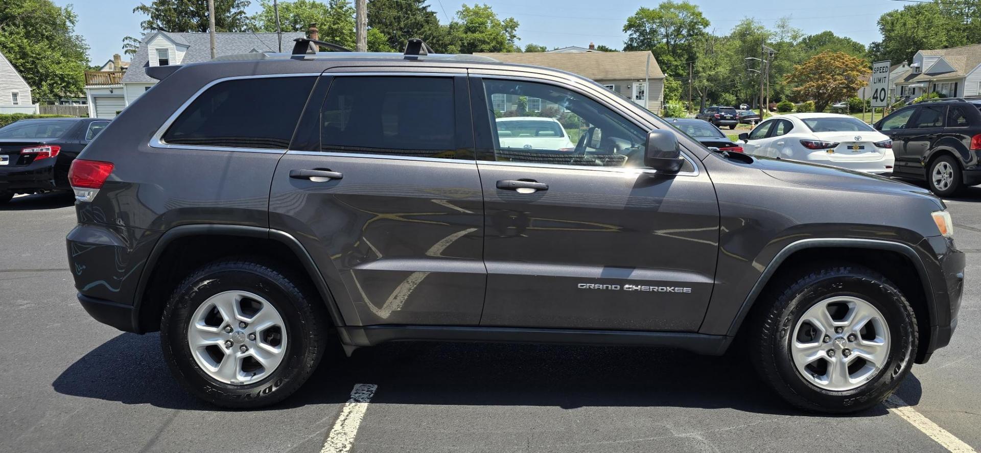2014 Gray /Black Jeep Grand Cherokee Laredo 4WD (1C4RJFAG2EC) with an 3.6L V6 DOHC 24V engine, 5-Speed Automatic transmission, located at 1010 N White Horse Pike, Stratford, NJ, 08084, (856) 262-9500, 39.838921, -75.011497 - If you want a midsize SUV that does a little of everything, the 2014 Jeep Grand Cherokee is tough to beat. Its well-trimmed cabin is comfy for five, and it's one of the few remaining utility vehicles that can handle both off-road trails and daily commutes. If you haven't been around a new Grand C - Photo#7