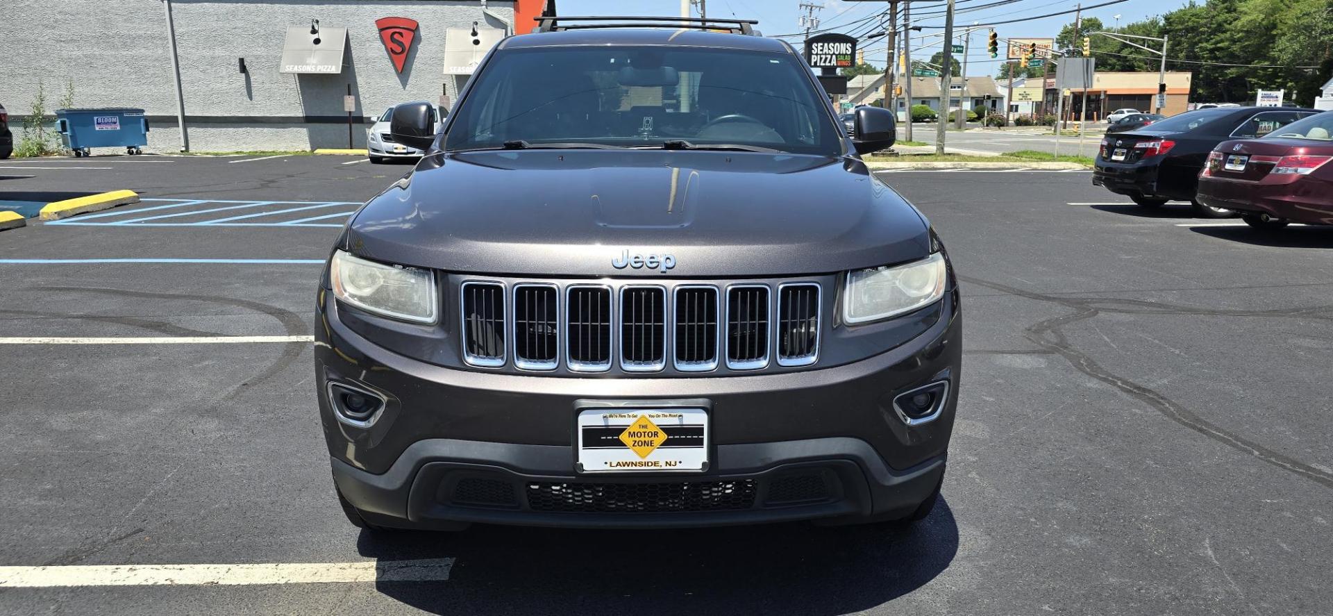 2014 Gray /Black Jeep Grand Cherokee Laredo 4WD (1C4RJFAG2EC) with an 3.6L V6 DOHC 24V engine, 5-Speed Automatic transmission, located at 1010 N White Horse Pike, Stratford, NJ, 08084, (856) 262-9500, 39.838921, -75.011497 - If you want a midsize SUV that does a little of everything, the 2014 Jeep Grand Cherokee is tough to beat. Its well-trimmed cabin is comfy for five, and it's one of the few remaining utility vehicles that can handle both off-road trails and daily commutes. If you haven't been around a new Grand C - Photo#4