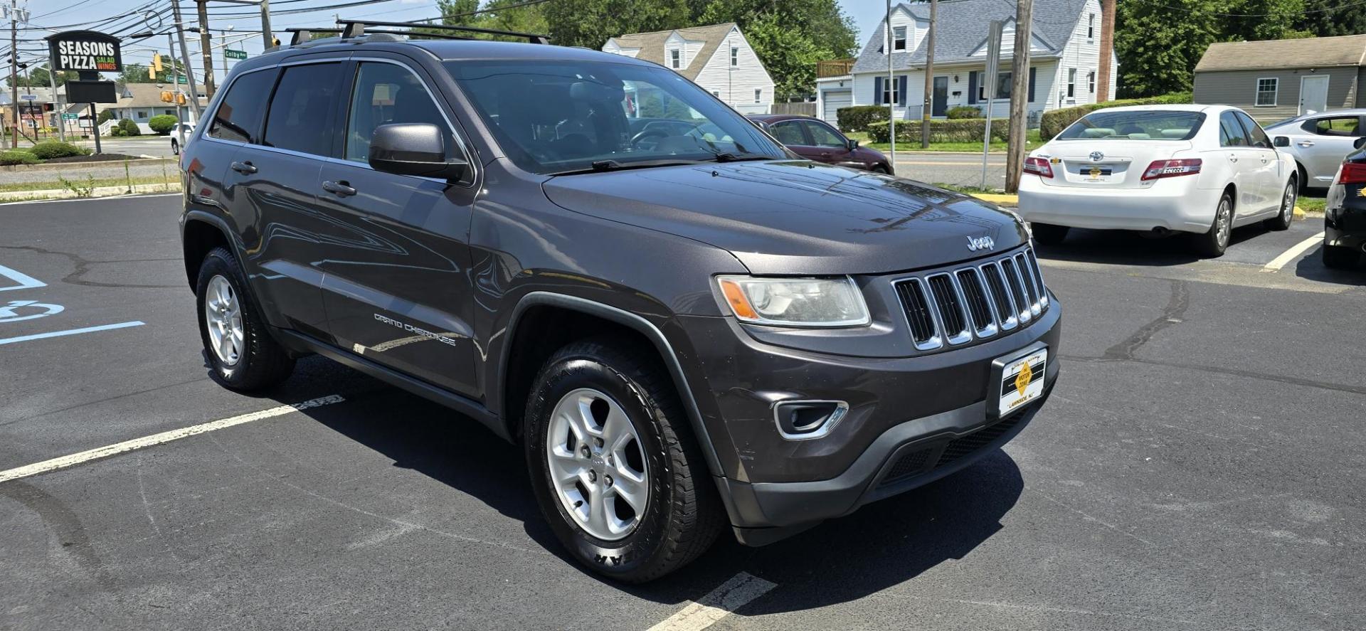 2014 Gray /Black Jeep Grand Cherokee Laredo 4WD (1C4RJFAG2EC) with an 3.6L V6 DOHC 24V engine, 5-Speed Automatic transmission, located at 1010 N White Horse Pike, Stratford, NJ, 08084, (856) 262-9500, 39.838921, -75.011497 - If you want a midsize SUV that does a little of everything, the 2014 Jeep Grand Cherokee is tough to beat. Its well-trimmed cabin is comfy for five, and it's one of the few remaining utility vehicles that can handle both off-road trails and daily commutes. If you haven't been around a new Grand C - Photo#1