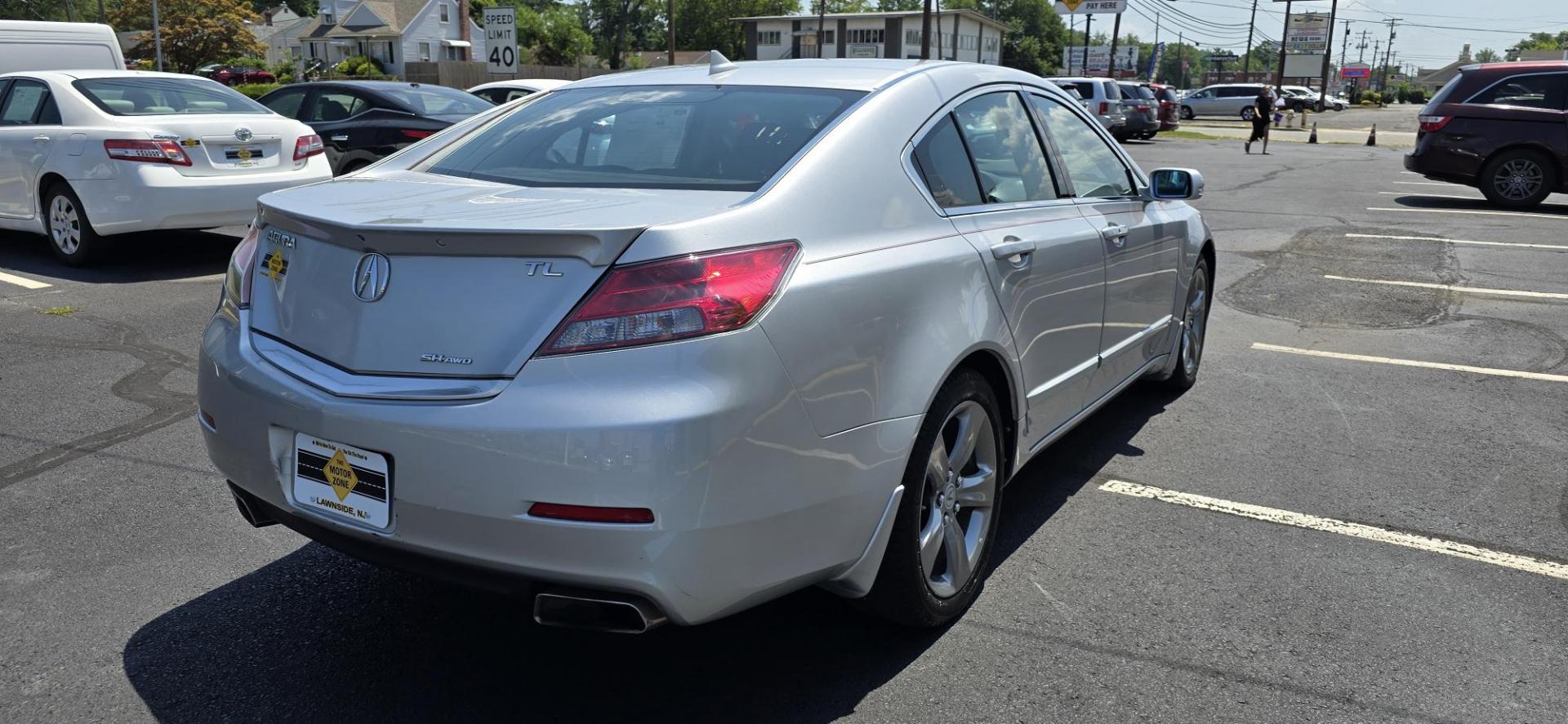 2012 Silver /Black Acura TL 6-Speed AT SH-AWD with Tech Package and HPT (19UUA9F57CA) with an 3.5L V6 SOHC 24V engine, 6-Speed Automatic transmission, located at 1010 N White Horse Pike, Stratford, NJ, 08084, (856) 262-9500, 39.838921, -75.011497 - The TL’s dramatic styling and breathtaking performance are rivaled only by its stunning technological achievements. Each model boasts an impressive engine: a 280 horse power 3.5-liter VTEC V-6 in the TL while the TL SH All Wheel Drive combines a powerful 305 horse power 3.7-liter VTEC V-6 with Sup - Photo#2