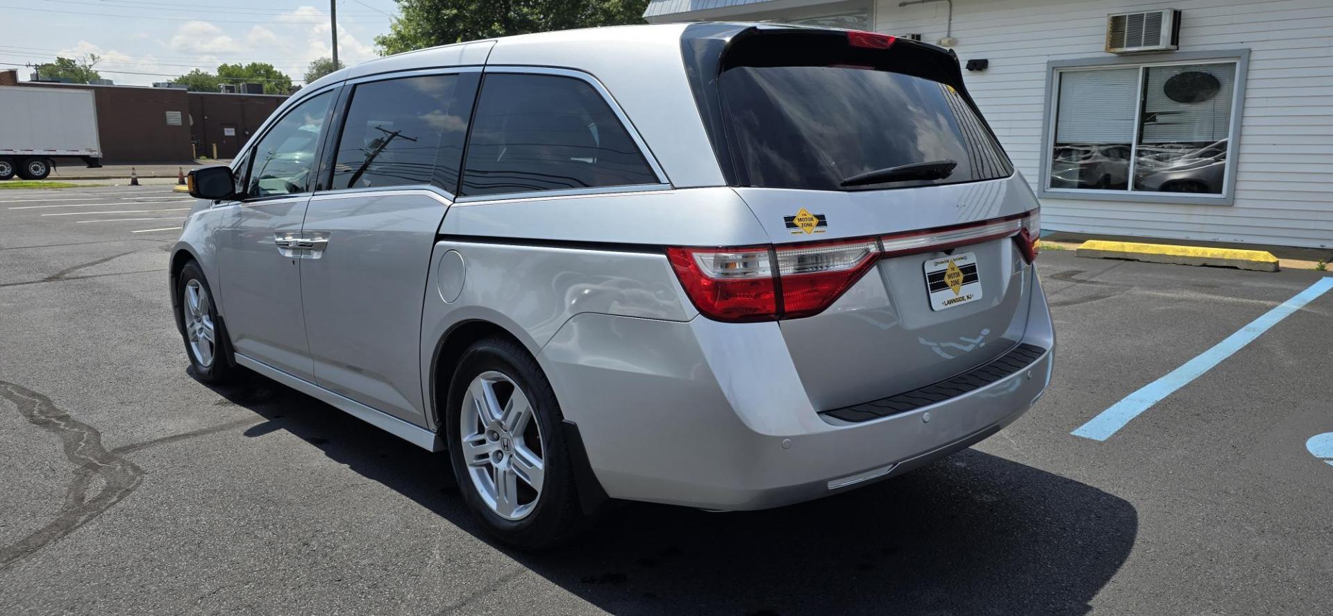 2013 Silver /SILVER Honda Odyssey Touring (5FNRL5H91DB) with an 3.5L V6 SOHC 24V engine, 5-Speed Automatic transmission, located at 1010 N White Horse Pike, Stratford, NJ, 08084, (856) 262-9500, 39.838921, -75.011497 - Photo#3