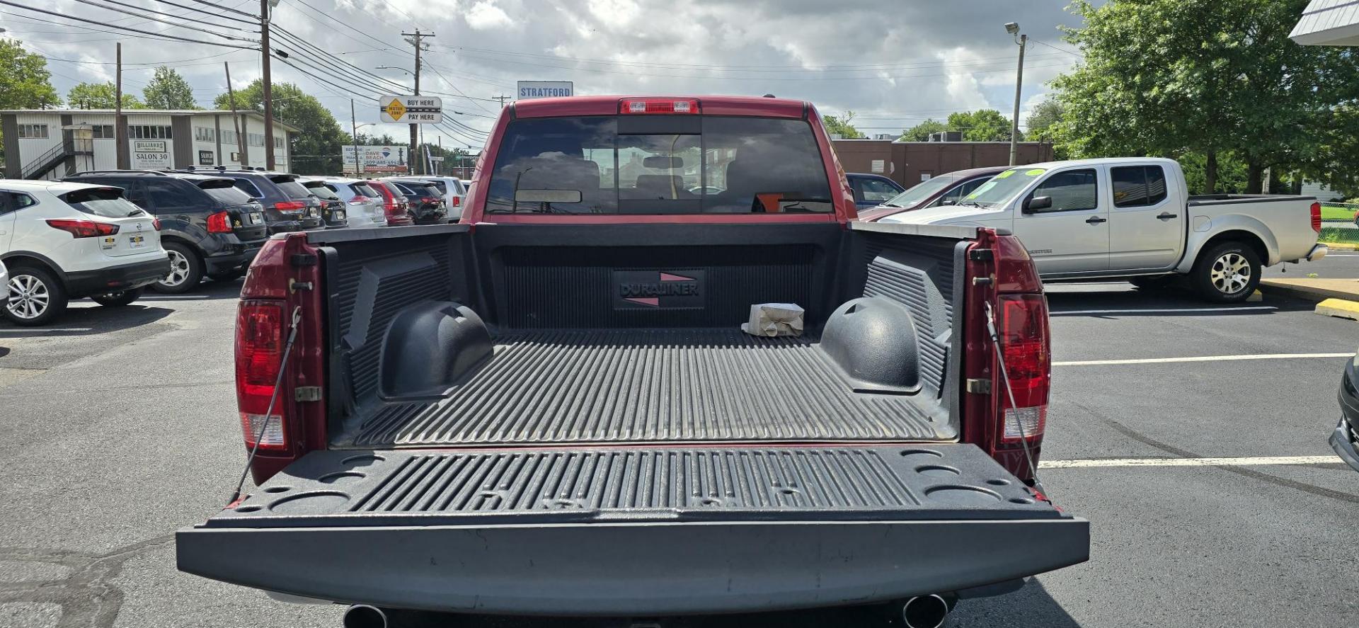 2011 Red /Black Dodge Ram 1500 Sport Quad Cab 4WD (1D7RV1GT8BS) with an 5.7L V8 OHV 16V engine, 5-Speed Automatic transmission, located at 1010 N White Horse Pike, Stratford, NJ, 08084, (856) 262-9500, 39.838921, -75.011497 - The 2011 Ram 1500 is a top pick in the full-size pickup truck segment thanks to its winning combination of strong performance, smooth ride and a classy cabin. Those of you wearing the baseball caps and nylon jackets with the Ram symbol on them won't get any argument from us; the 2011 Ram 1500 is tou - Photo#8