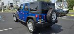 2016 Blue /Charcoal Jeep Wrangler Unlimited Sport 4WD (1C4BJWDG3GL) with an 3.6L V6 DOHC 24V FFV engine, 5-Speed Automatic transmission, located at 1010 N White Horse Pike, Stratford, NJ, 08084, (856) 262-9500, 39.838921, -75.011497 - Photo#2