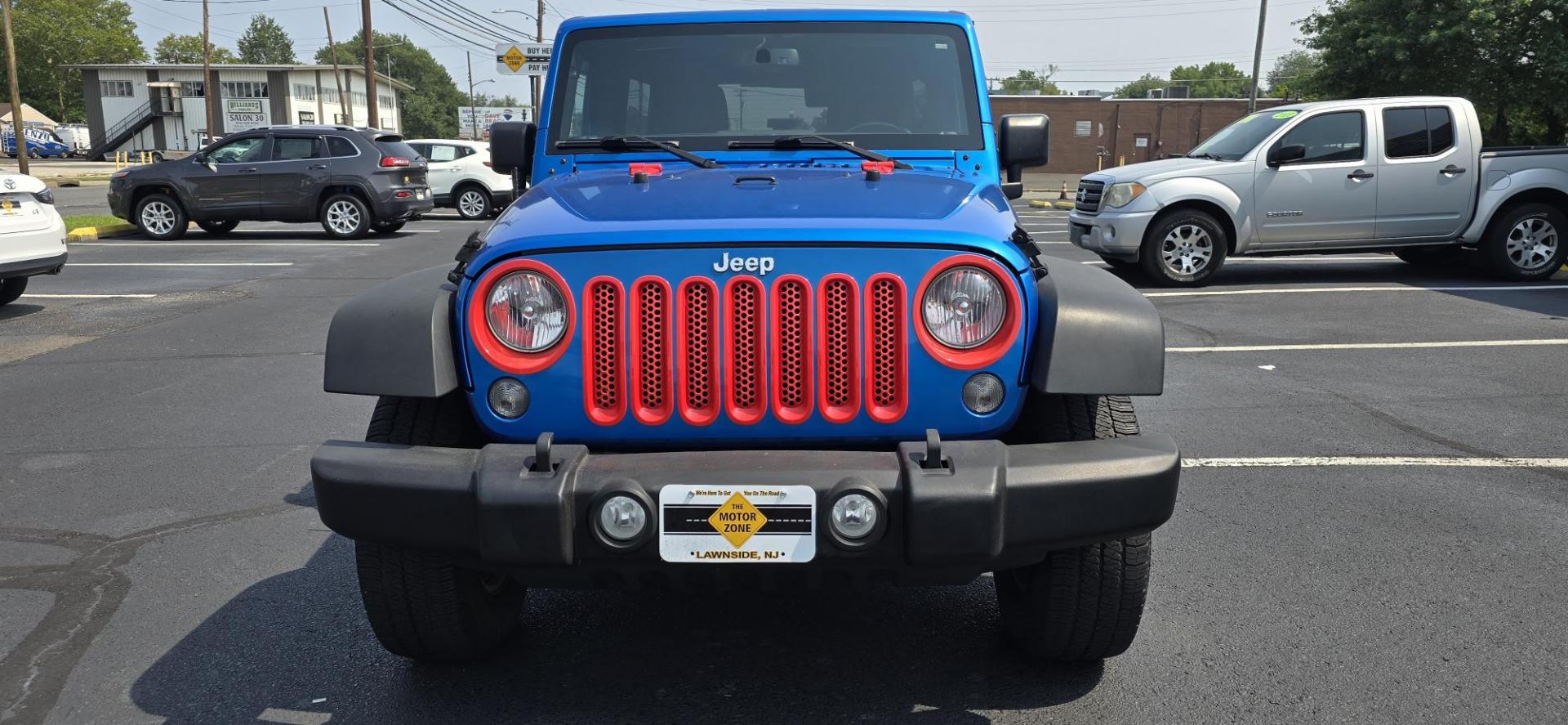 2016 Blue /Charcoal Jeep Wrangler Unlimited Sport 4WD (1C4BJWDG3GL) with an 3.6L V6 DOHC 24V FFV engine, 5-Speed Automatic transmission, located at 1010 N White Horse Pike, Stratford, NJ, 08084, (856) 262-9500, 39.838921, -75.011497 - Photo#4