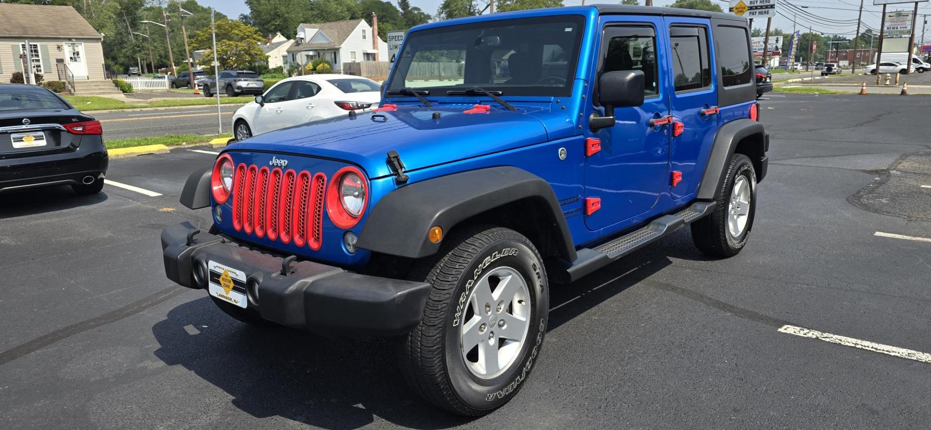 2016 Blue /Charcoal Jeep Wrangler Unlimited Sport 4WD (1C4BJWDG3GL) with an 3.6L V6 DOHC 24V FFV engine, 5-Speed Automatic transmission, located at 1010 N White Horse Pike, Stratford, NJ, 08084, (856) 262-9500, 39.838921, -75.011497 - Photo#0