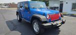 2016 Blue /Charcoal Jeep Wrangler Unlimited Sport 4WD (1C4BJWDG3GL) with an 3.6L V6 DOHC 24V FFV engine, 5-Speed Automatic transmission, located at 1010 N White Horse Pike, Stratford, NJ, 08084, (856) 262-9500, 39.838921, -75.011497 - Photo#1