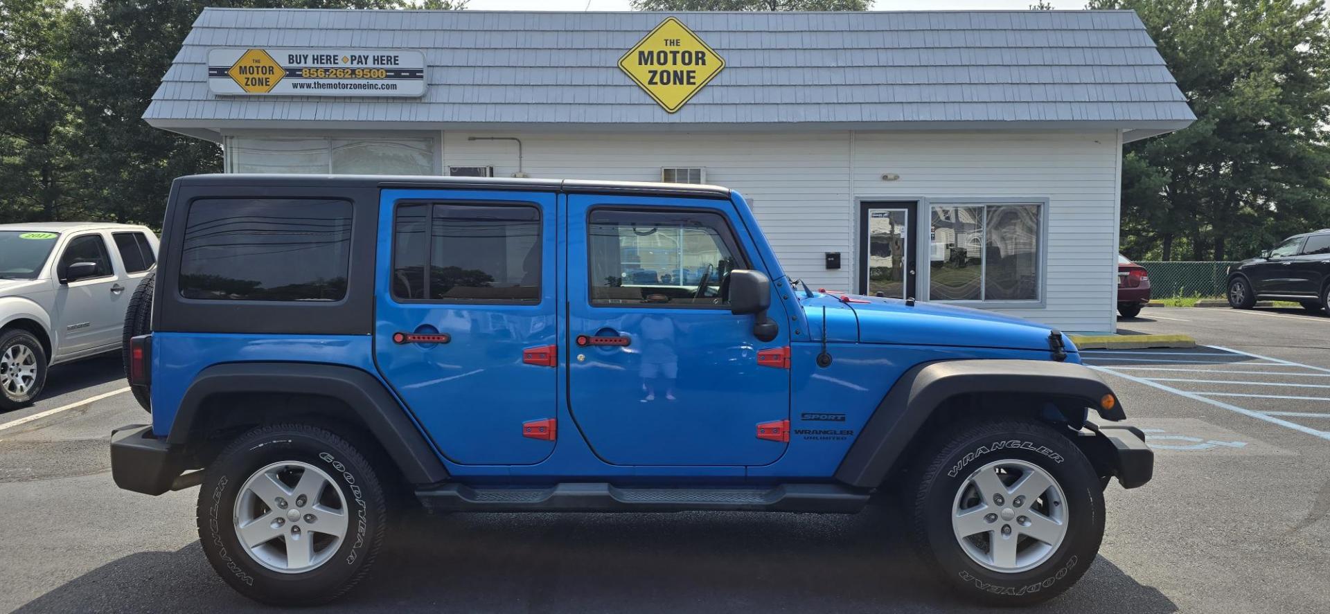 2016 Blue /Charcoal Jeep Wrangler Unlimited Sport 4WD (1C4BJWDG3GL) with an 3.6L V6 DOHC 24V FFV engine, 5-Speed Automatic transmission, located at 1010 N White Horse Pike, Stratford, NJ, 08084, (856) 262-9500, 39.838921, -75.011497 - Photo#7