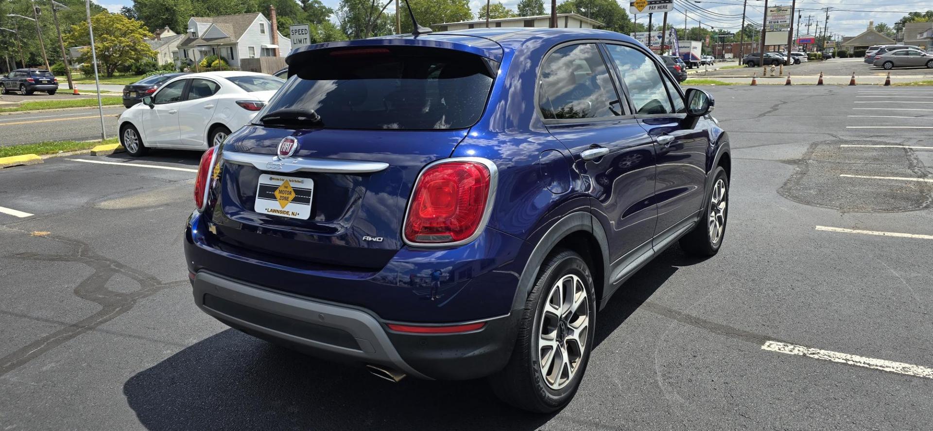 2016 Blue /Black Fiat 500x Lounge AWD (ZFBCFYCTXGP) with an 2.4L L4 engine, 9-Speed Automatic transmission, located at 1010 N White Horse Pike, Stratford, NJ, 08084, (856) 262-9500, 39.838921, -75.011497 - Photo#2