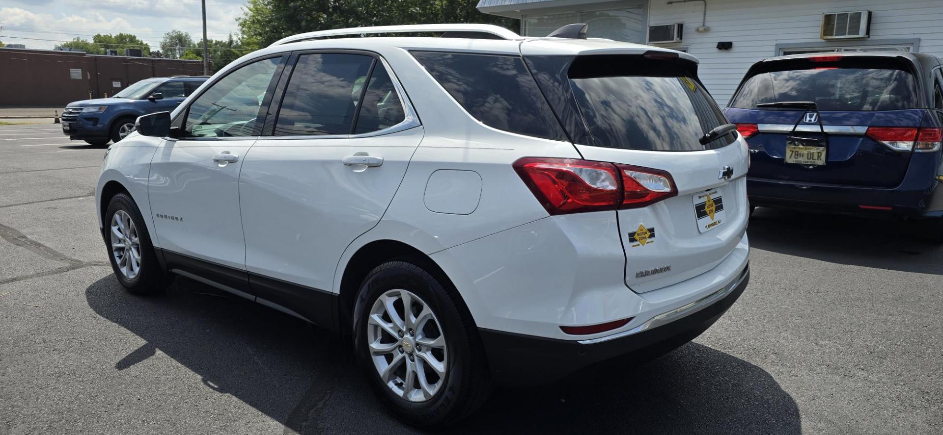 2018 White /Black Chevrolet Equinox LT AWD (2GNAXSEV4J6) with an 1.5L L4 DIR DOHC 16V TURBO engine, 6A transmission, located at 1010 N White Horse Pike, Stratford, NJ, 08084, (856) 262-9500, 39.838921, -75.011497 - Photo#3