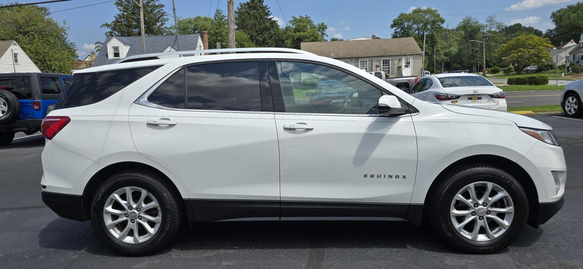 2018 White /Black Chevrolet Equinox LT AWD (2GNAXSEV4J6) with an 1.5L L4 DIR DOHC 16V TURBO engine, 6A transmission, located at 1010 N White Horse Pike, Stratford, NJ, 08084, (856) 262-9500, 39.838921, -75.011497 - Photo#4