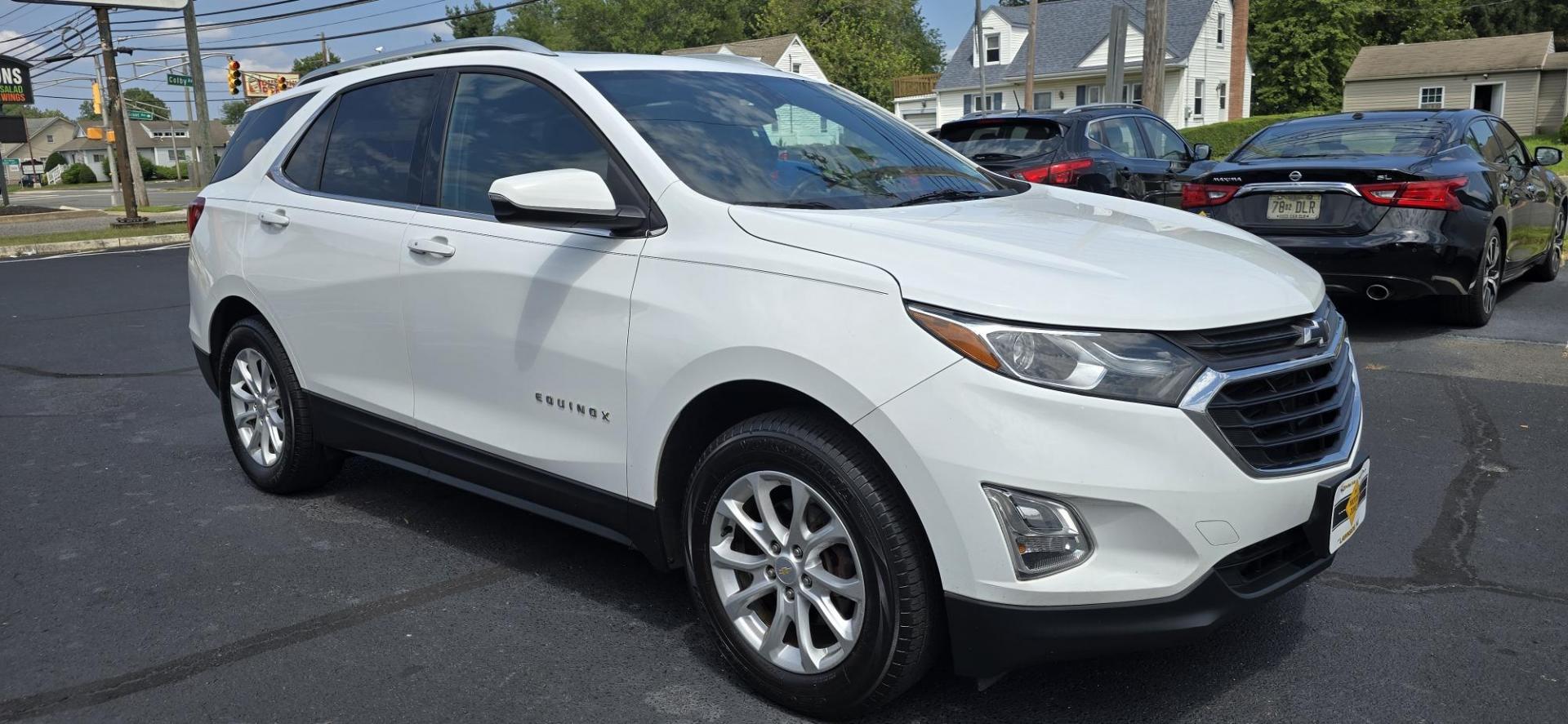 2018 White /Black Chevrolet Equinox LT AWD (2GNAXSEV4J6) with an 1.5L L4 DIR DOHC 16V TURBO engine, 6A transmission, located at 1010 N White Horse Pike, Stratford, NJ, 08084, (856) 262-9500, 39.838921, -75.011497 - Photo#1