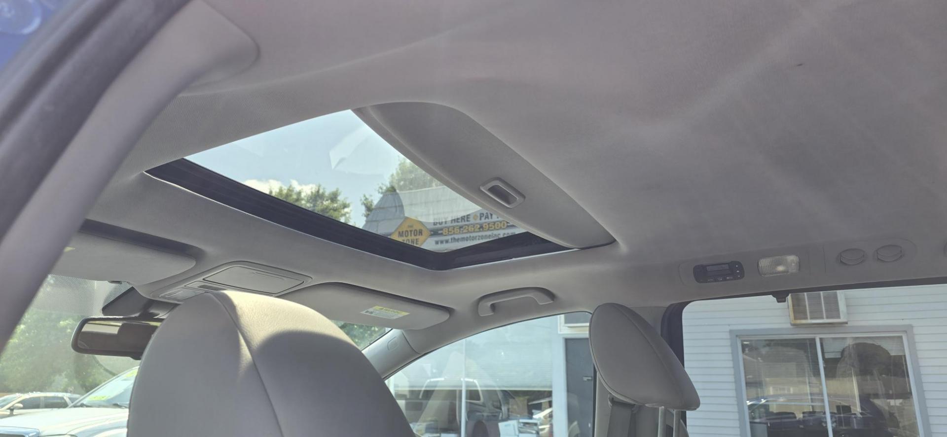 2015 Blue /Gray Honda Odyssey EX-L (5FNRL5H65FB) with an 3.5L V6 SOHC 24V engine, 6-Speed Automatic transmission, located at 1010 N White Horse Pike, Stratford, NJ, 08084, (856) 262-9500, 39.838921, -75.011497 - Photo#11