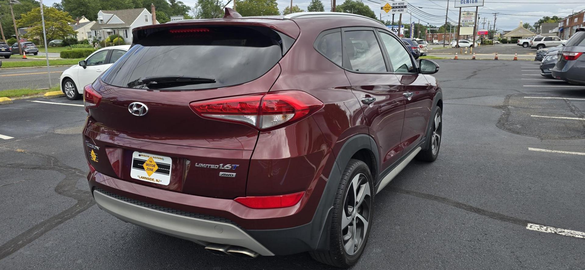 2017 Maroon /Tan Hyundai Tucson Eco AWD (KM8J3CA27HU) with an 1.6L L4 DOHC 16V engine, 7A transmission, located at 1010 N White Horse Pike, Stratford, NJ, 08084, (856) 262-9500, 39.838921, -75.011497 - Photo#2