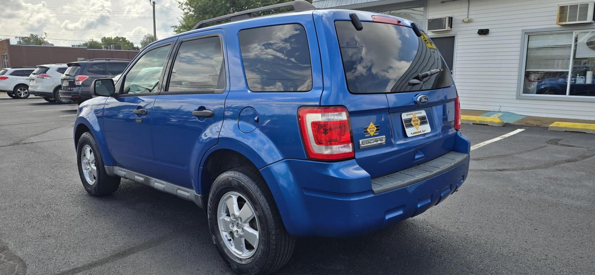 2011 Blue /CHARCOAL Ford Escape XLT FWD (1FMCU0D72BK) with an 2.5L L4 DOHC 16V engine, 6-Speed Automatic transmission, located at 1010 N White Horse Pike, Stratford, NJ, 08084, (856) 262-9500, 39.838921, -75.011497 - Photo#2