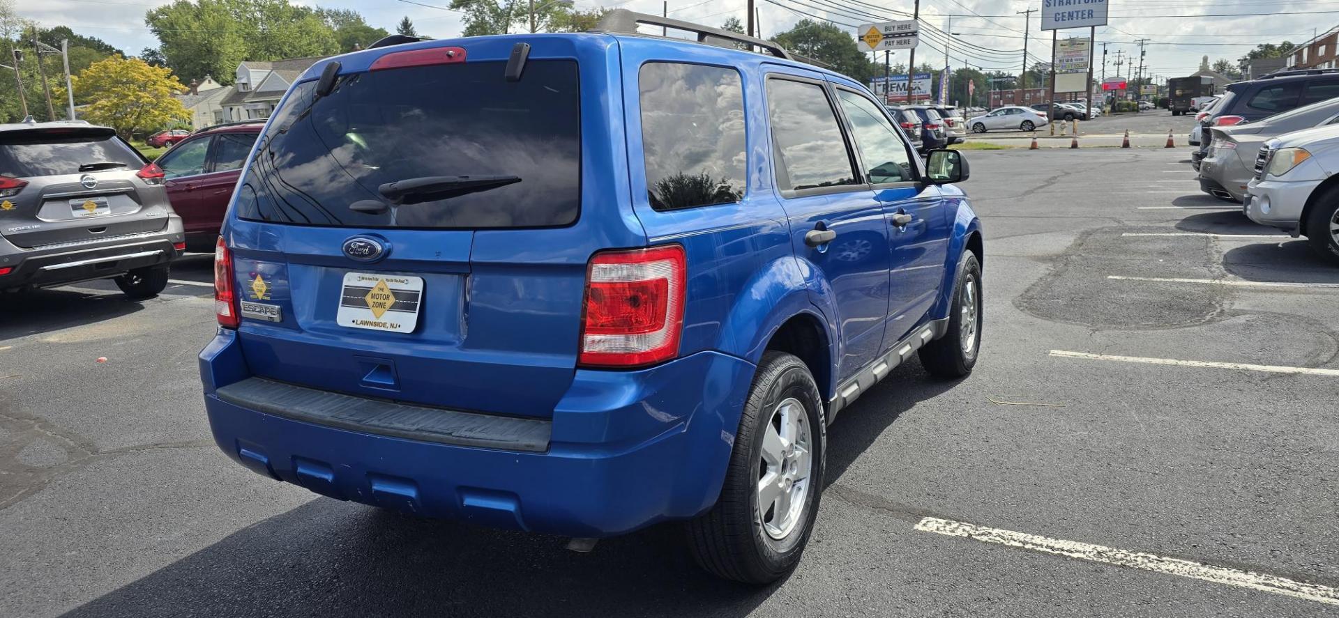2011 Blue /CHARCOAL Ford Escape XLT FWD (1FMCU0D72BK) with an 2.5L L4 DOHC 16V engine, 6-Speed Automatic transmission, located at 1010 N White Horse Pike, Stratford, NJ, 08084, (856) 262-9500, 39.838921, -75.011497 - Photo#3