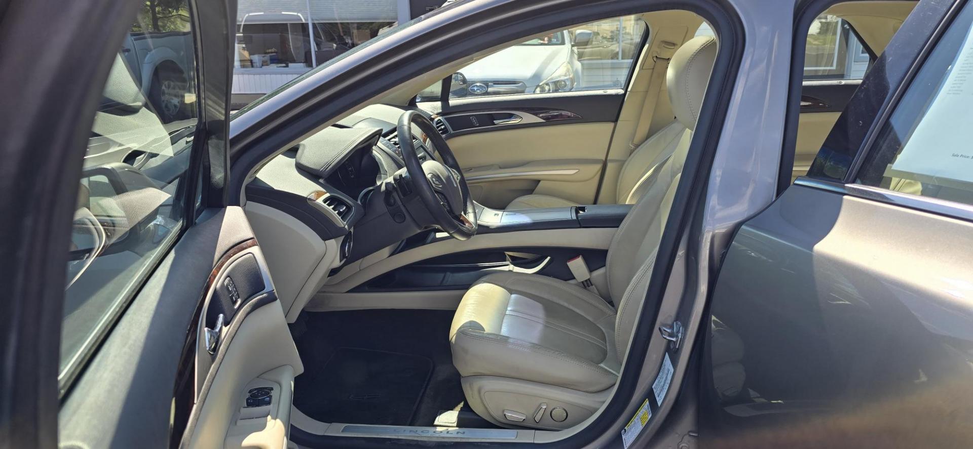 2015 Gray /Tan Lincoln MKZ AWD (3LN6L2J93FR) with an 2.0L L4 DOHC 16V engine, 6-Speed Automatic transmission, located at 1010 N White Horse Pike, Stratford, NJ, 08084, (856) 262-9500, 39.838921, -75.011497 - Photo#8