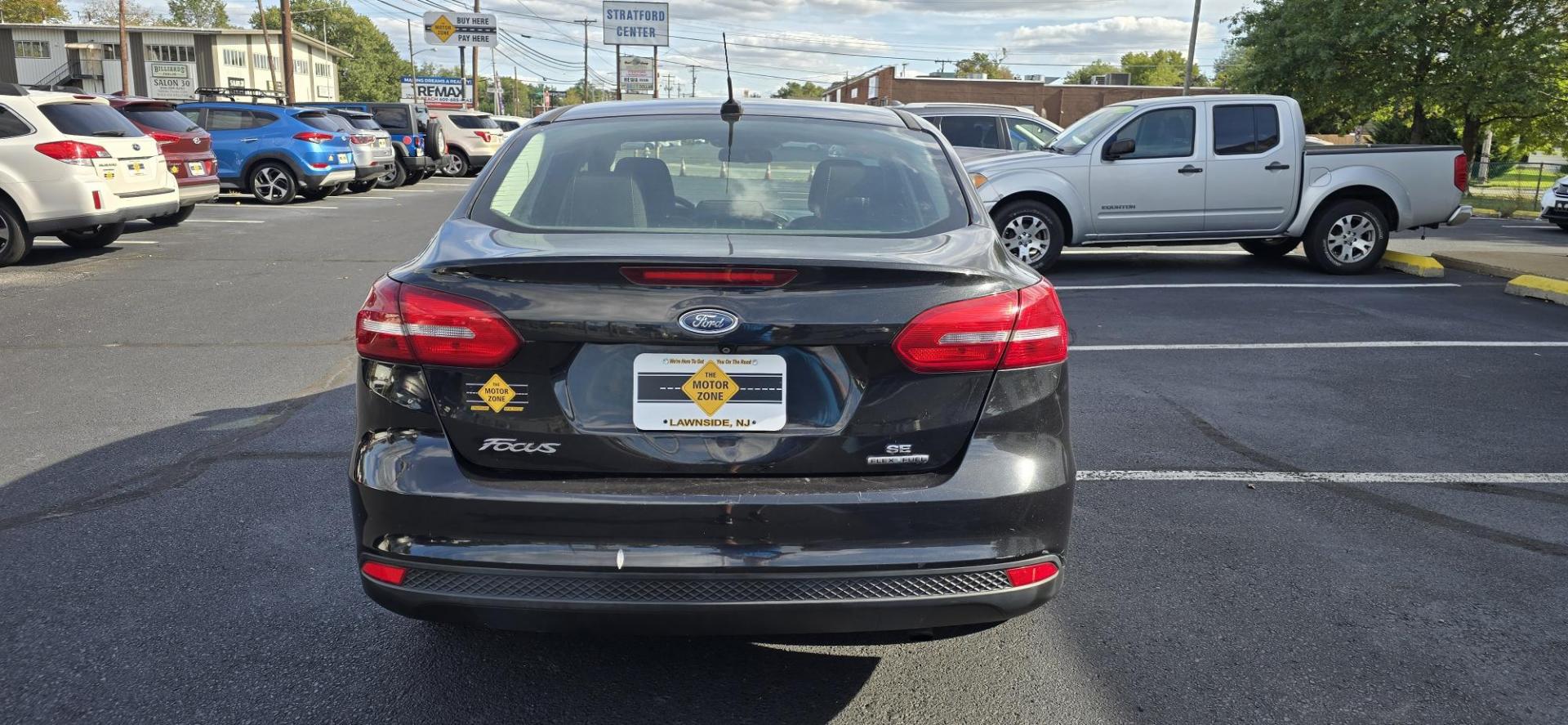 2015 Black /Black Ford Focus SE Sedan (1FADP3F25FL) with an 2.0L L4 DOHC 16V engine, AUTOMATIC transmission, located at 1010 N White Horse Pike, Stratford, NJ, 08084, (856) 262-9500, 39.838921, -75.011497 - Photo#7